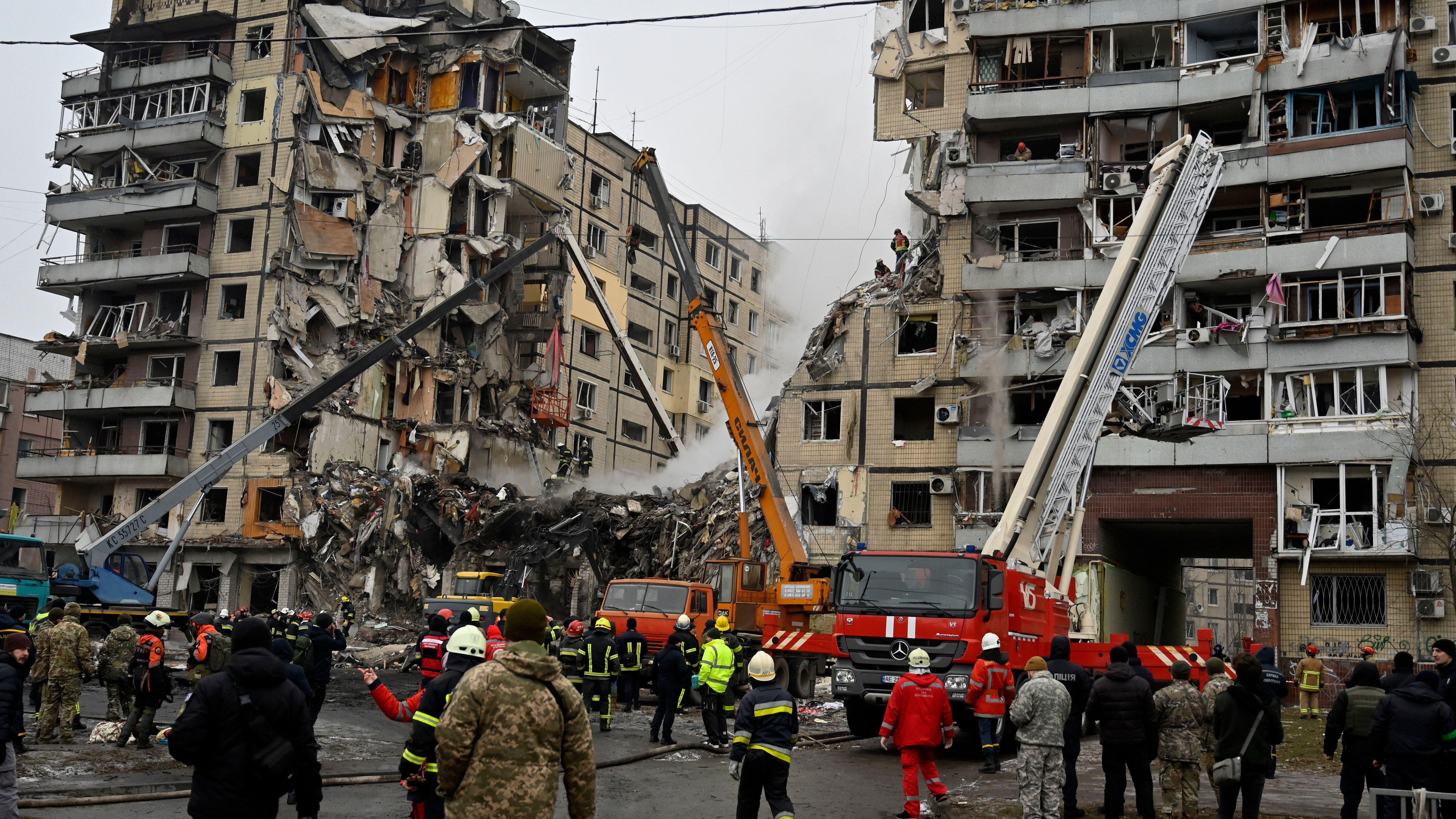 Image ID 2M8X7AF Rescuers dismantle the rubble of a destroyed house as a result of a missile attack by Russian 15012023 CREDIT Sergei Chuzavkov,SOPA Images, Alamy EXP 16022024.jpg