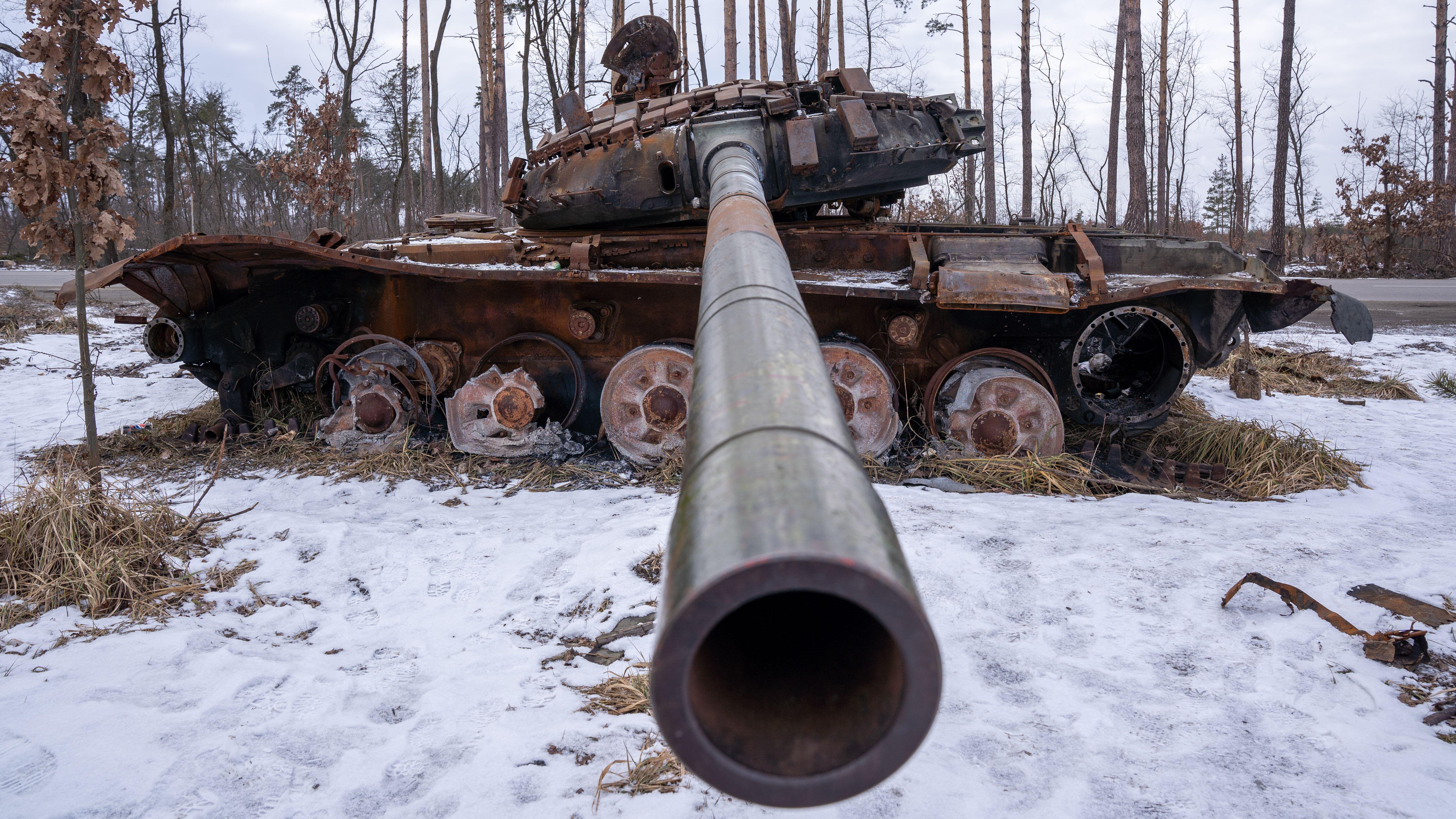 Destroyed Russian Tank lays beside the road in Bucha (Picture: Alamy).