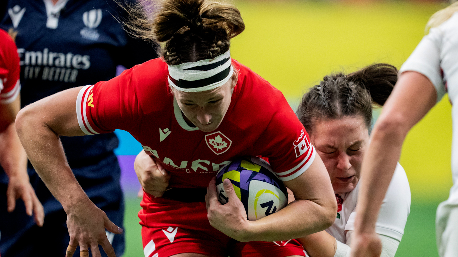 Image ID 2YAC1TJ Canada's Laetitia Royer, left, is tackled by England's Amy Cokayne, right, during WXV 1 women's rugby union action, in Vancouver CREDIT The Canadian Press Alamy Live News EXP 23112024.jpg
