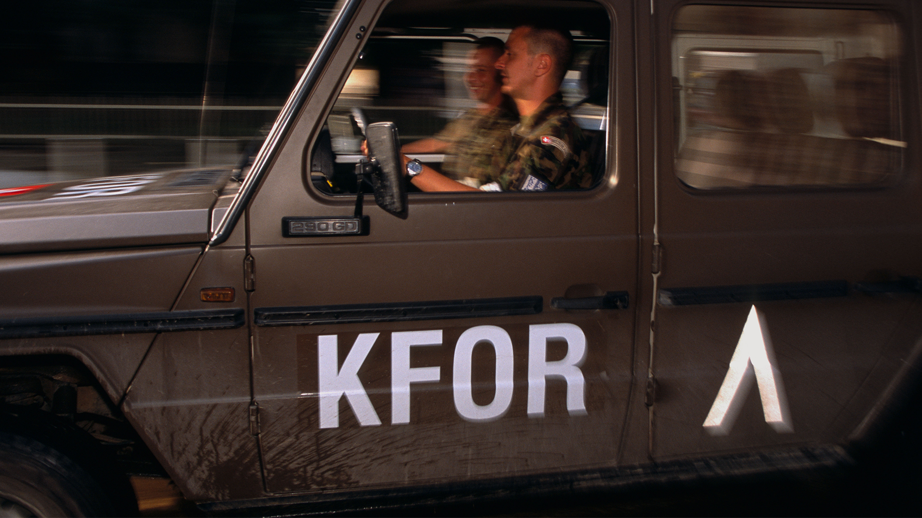 A KFOR Jeep with soldiers driving by in Kosovo CREDIT ALAMY 240523.png