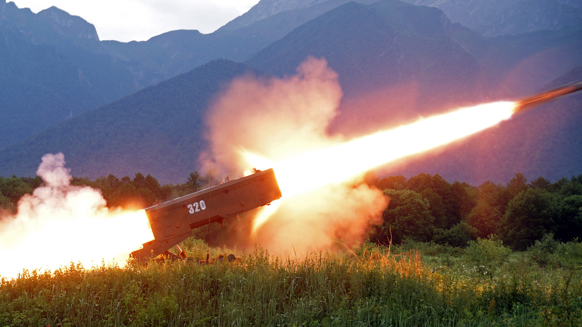 A BM-1 combat vehicle takes part in live firing exercises for TOS-1A Solntsepyok heavy flamethrower units at Tarskoye firing range in Russia