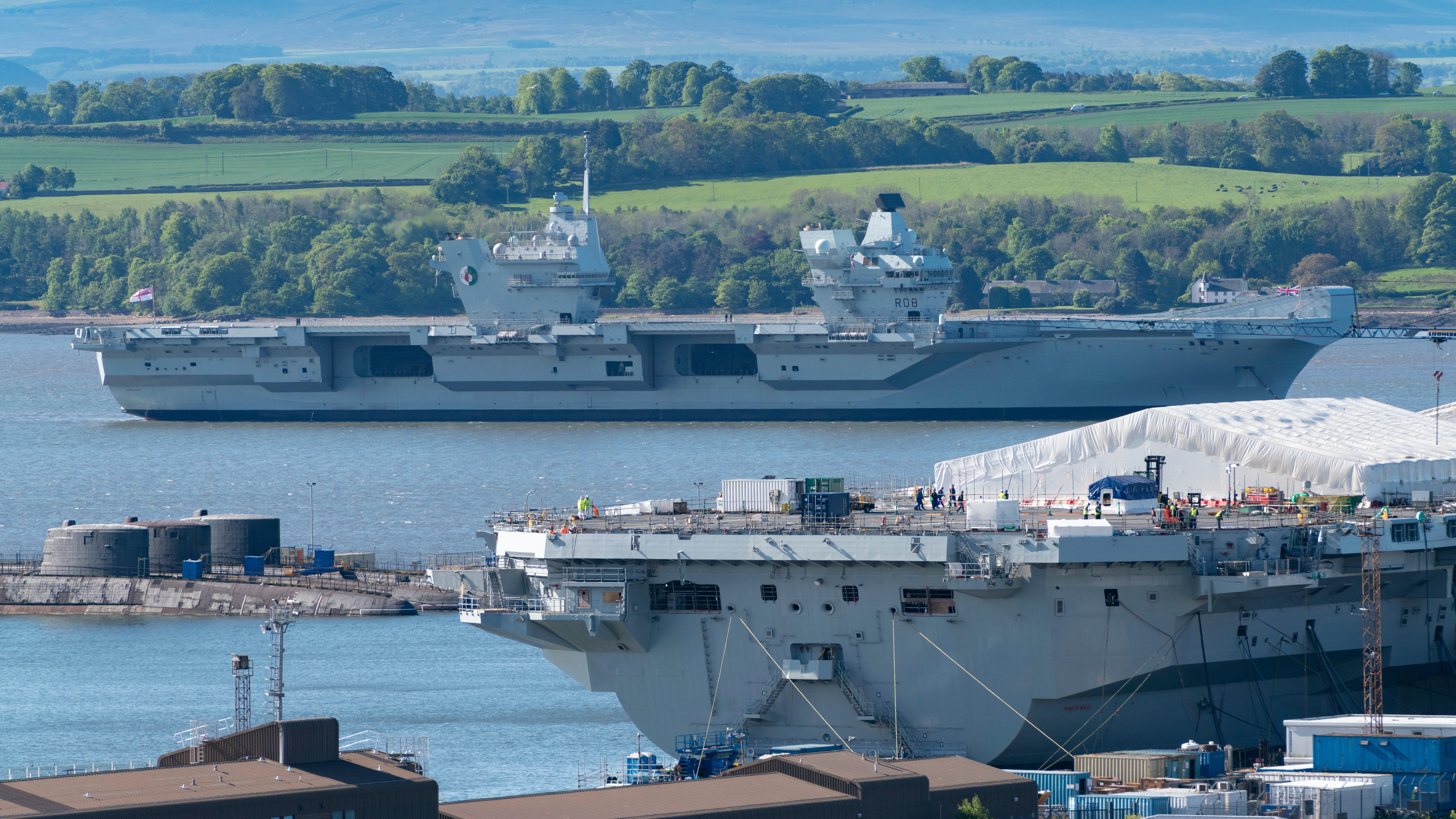 Image ID TR80BW Aircraft carrier HMS Queen Elizabeth moored off Rosyth in River Forth after leaving dry dock in 2019 22052019 CREDIT Alamy Stock Photo.jpg