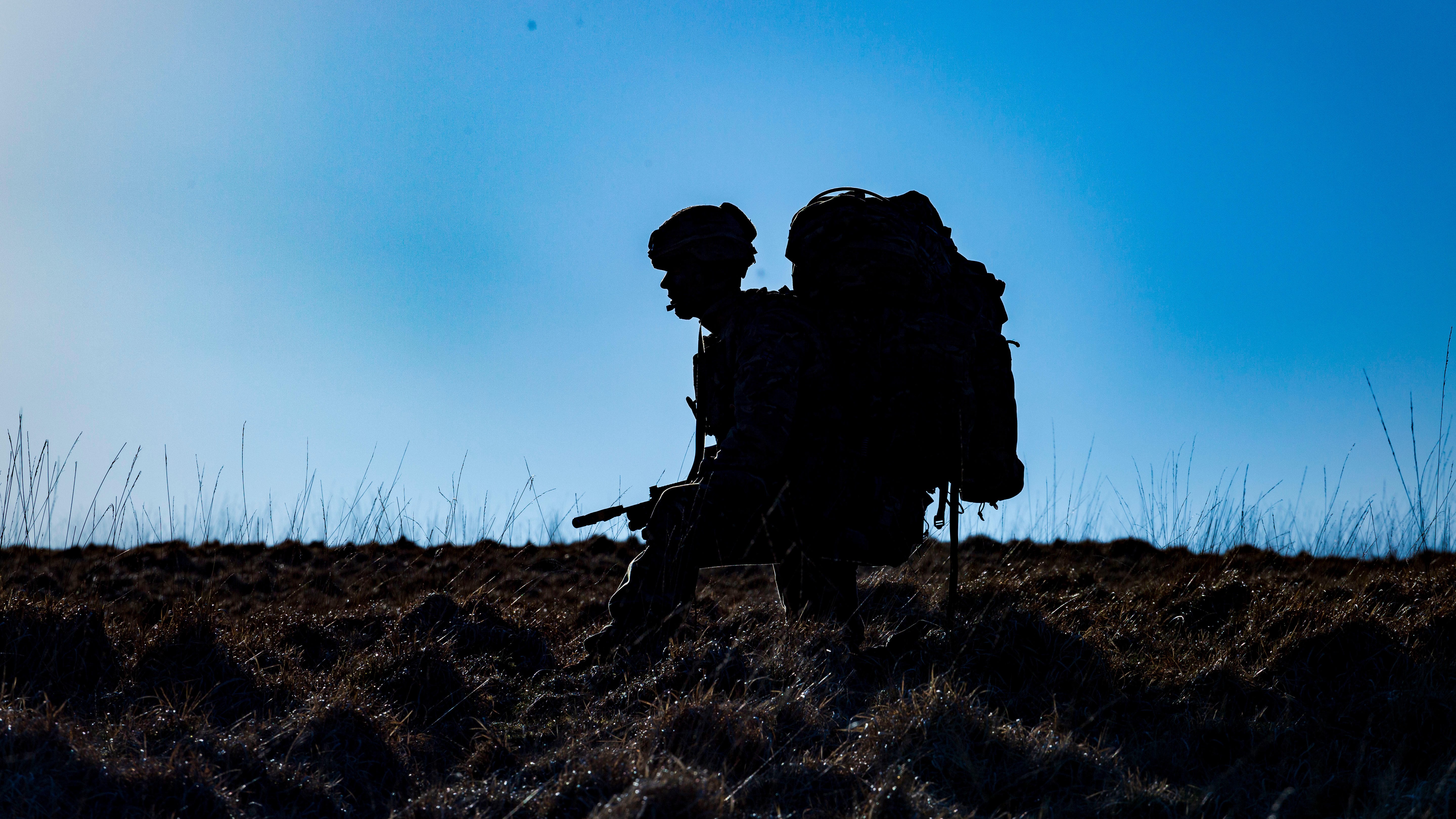 Image ID W26B2T ANON Royal Marine carrying his bergen and rifle 27032019 CREDIT Alamy Stock Photo