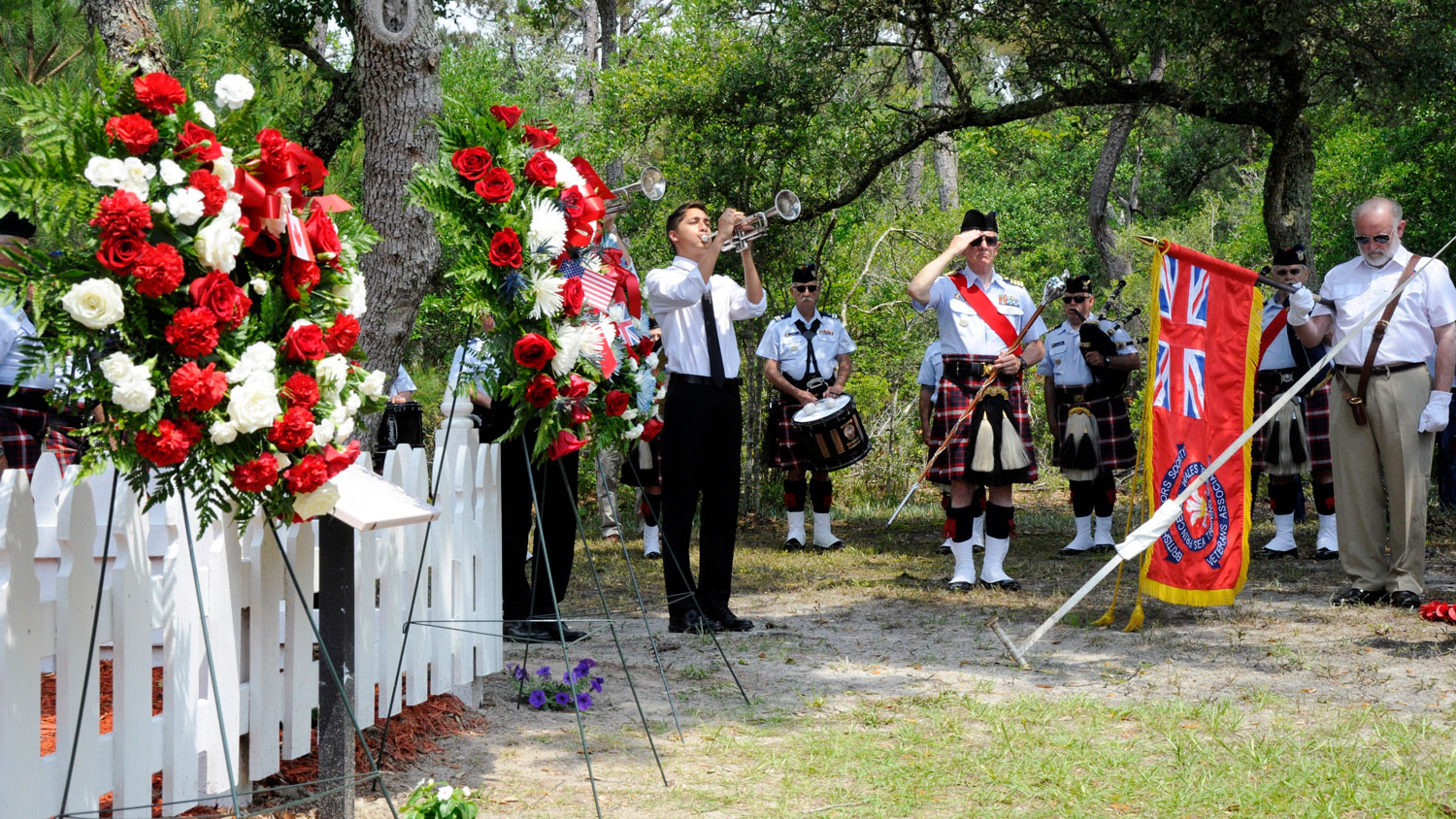 Image ID 3379331 Student Enrique Babilonia plays the Last Post in Buxton, North Carolina on 11 May 2017 CREDIT US Coast Guard
