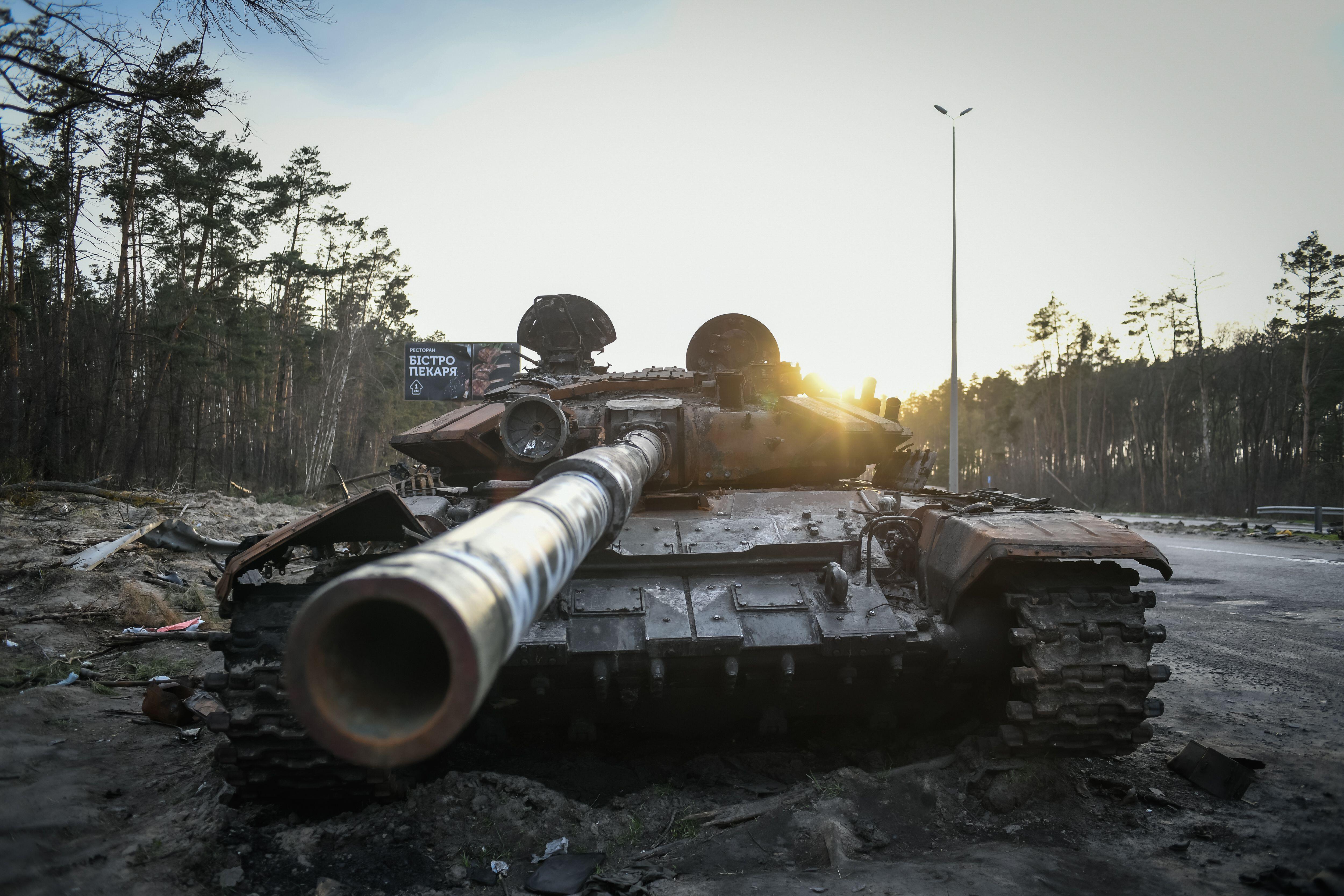 Russian tanks destroyed in the outskirts of Kyiv with Wolverines sprayed on the barrel (Picture: Piero Cruciatti/Alamy).