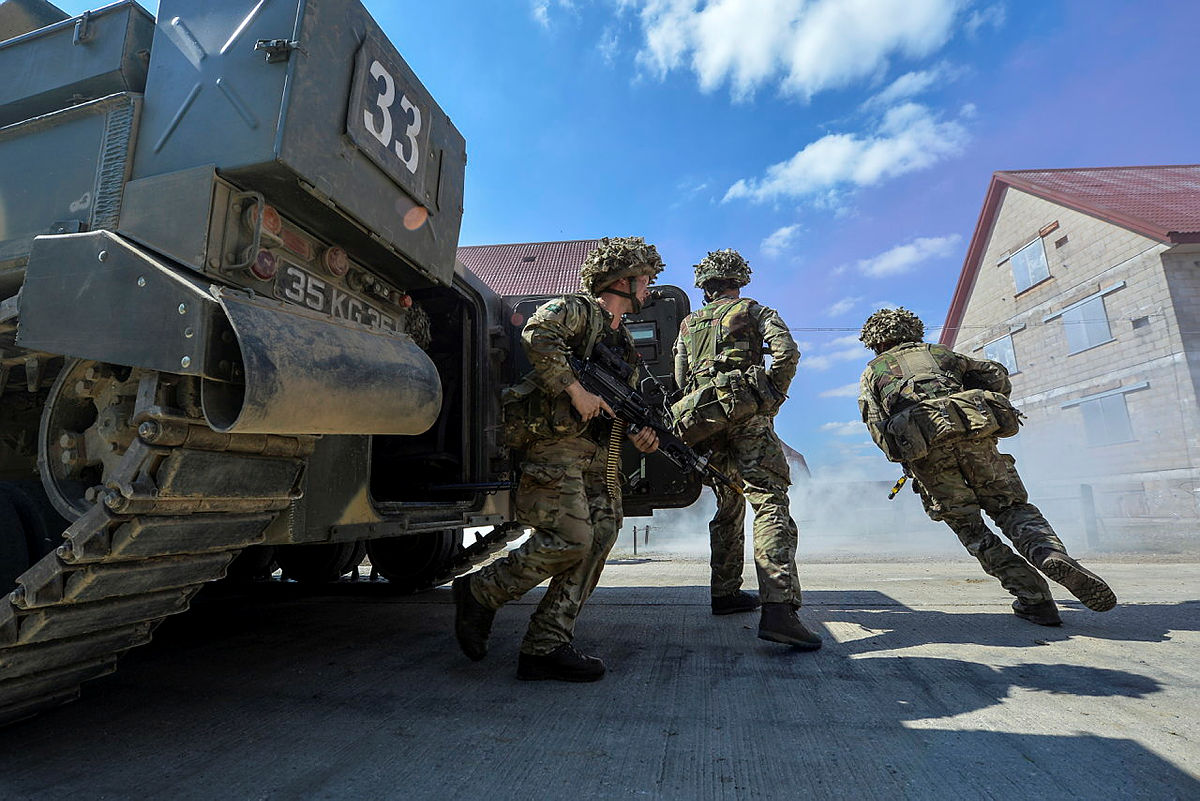 Infantry departing a Warrior during Exercise Lion Strike in 2014 (picture: MOD)