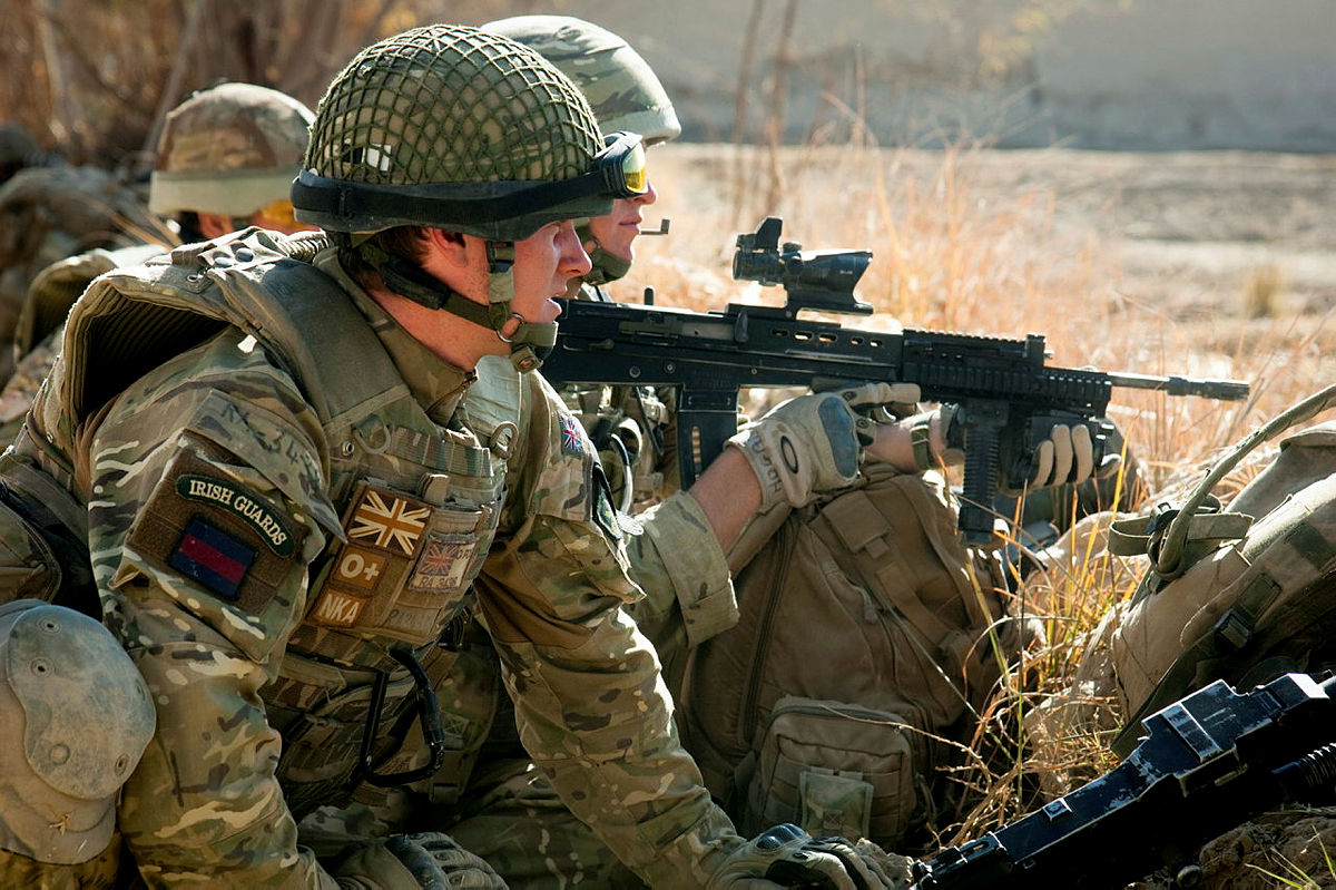 The L85A2 was a far more competent rifle, seen here being carried by infanteers from the Irish Guards in Afghanistan (Picture: MOD)
