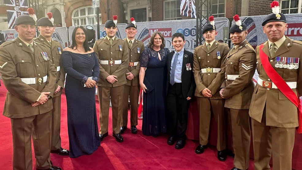 Jack and Rebecca Rigby with Scotty's founder Nikki Scott and Royal Fusiliers at the 2023 Pride Of Britain Awards CREDIT Scotty's Little Soldiers