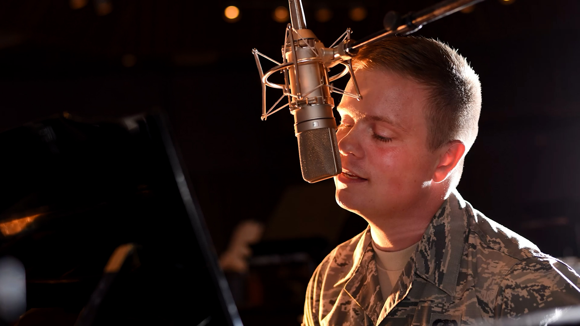 Former US Air Force Band member, James Teachenor, was the songwriter