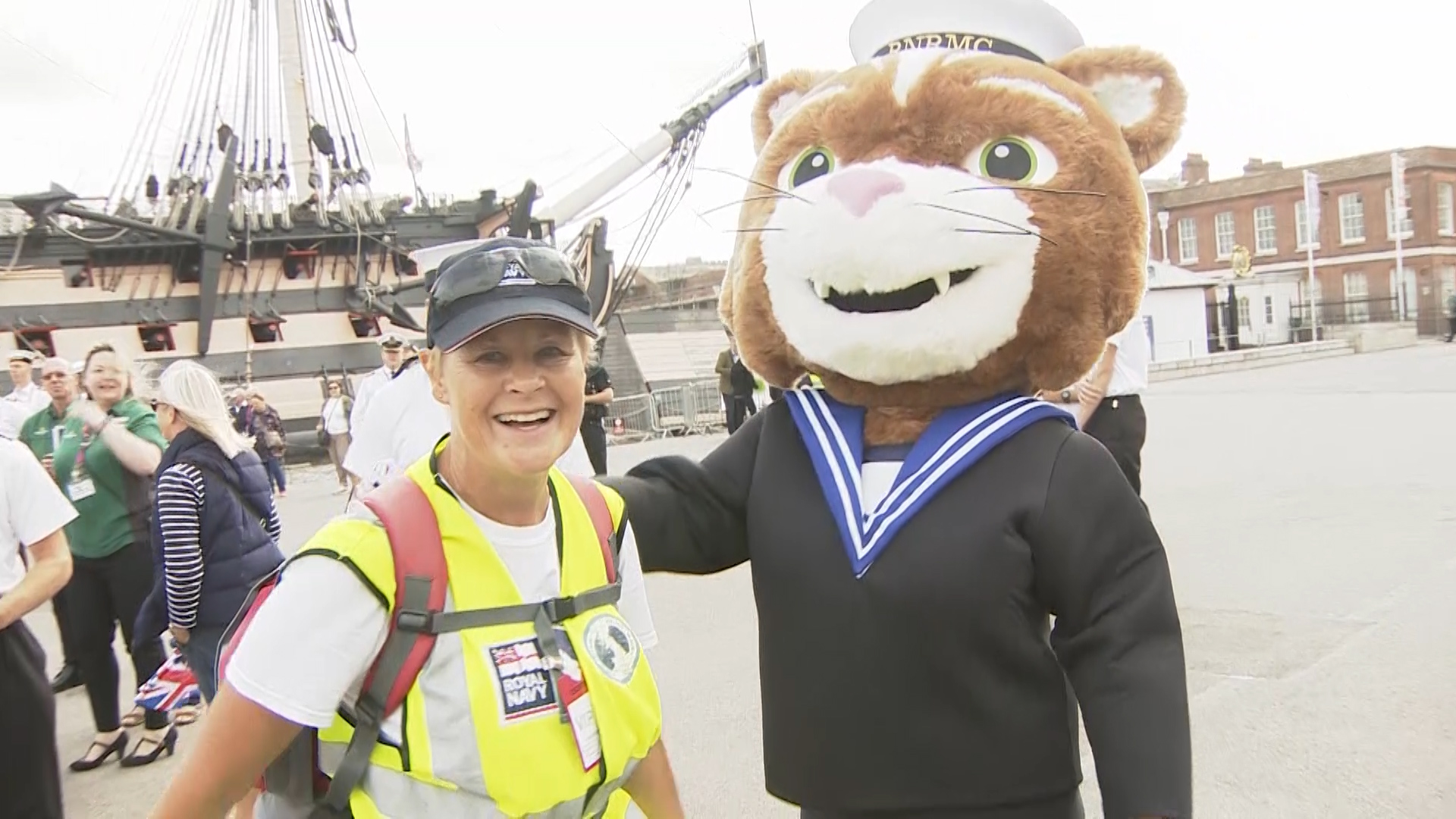 Jane Allen is greeted at the finish line in Portsmouth.