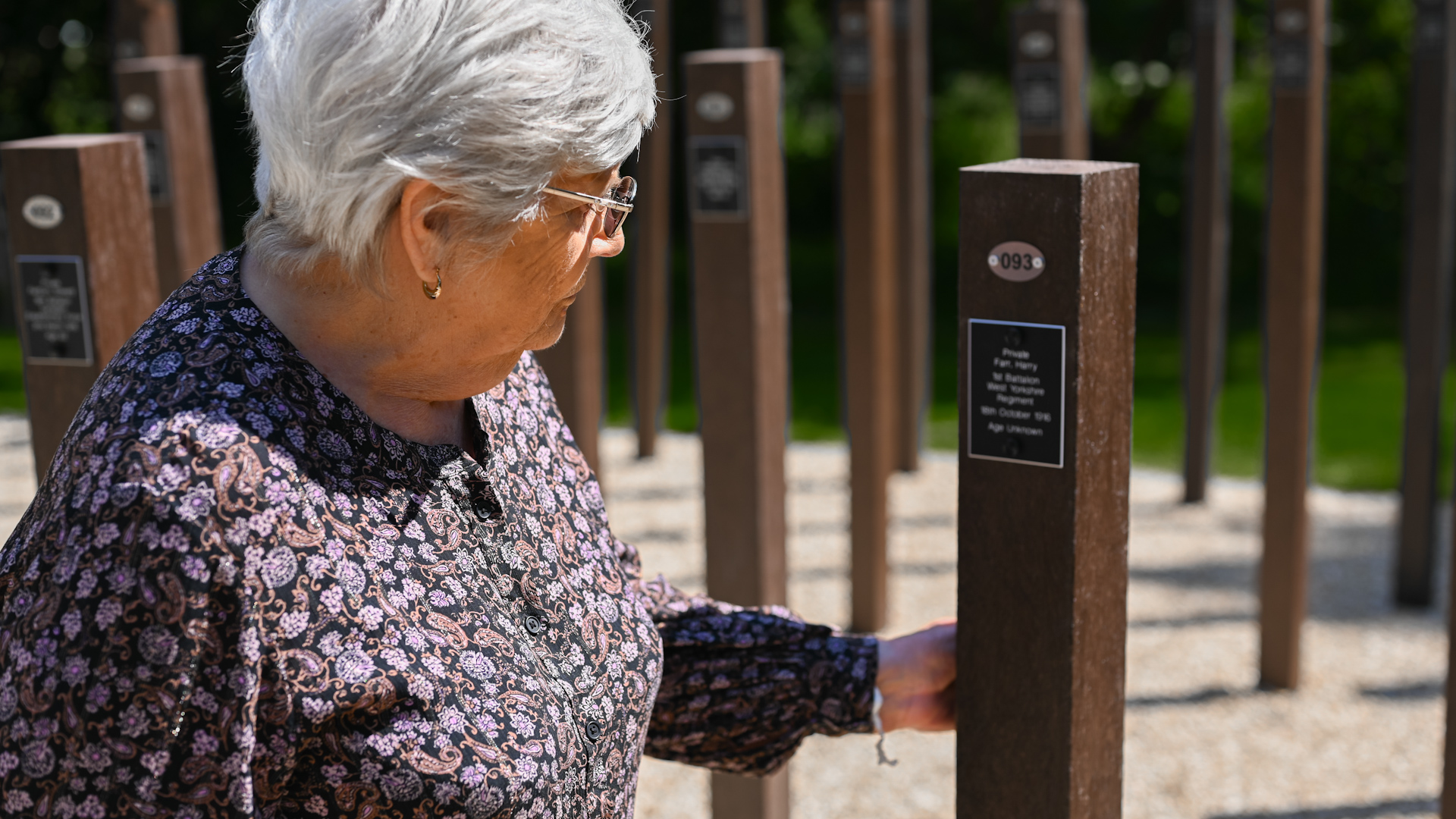 Janet Booth visiting the Shot At Dawn memorial, whose grandfather Harry Farr was executed in 1916 (Picture: National Memorial Arboretum)