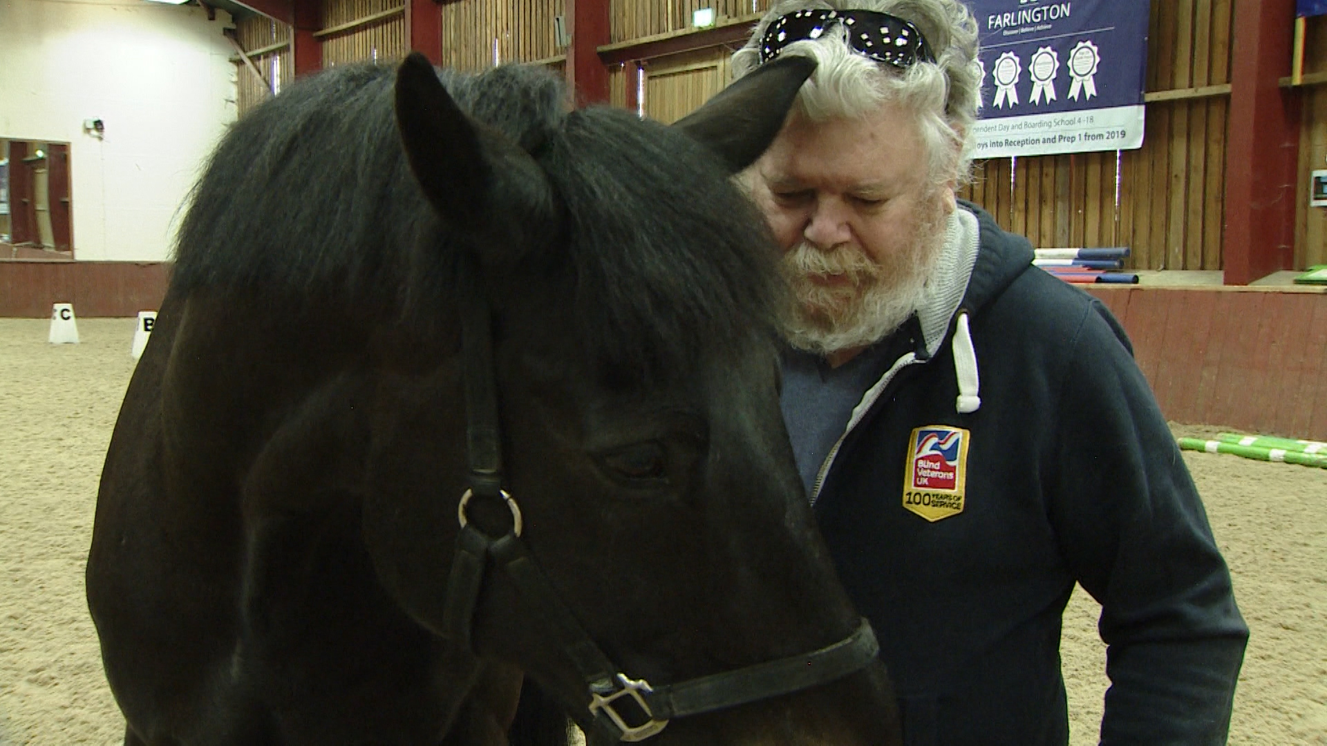 Jeffrey Stockwell at the Merrist Wood College with a horse 250319 CREDIT BFBS.jpg 