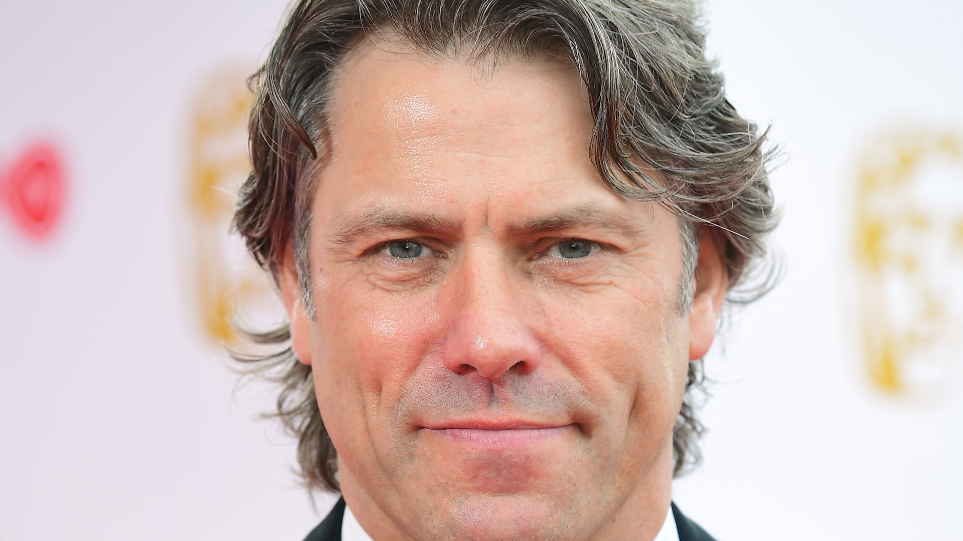 Cover image: John Bishop in 2018 (Picture: PA).