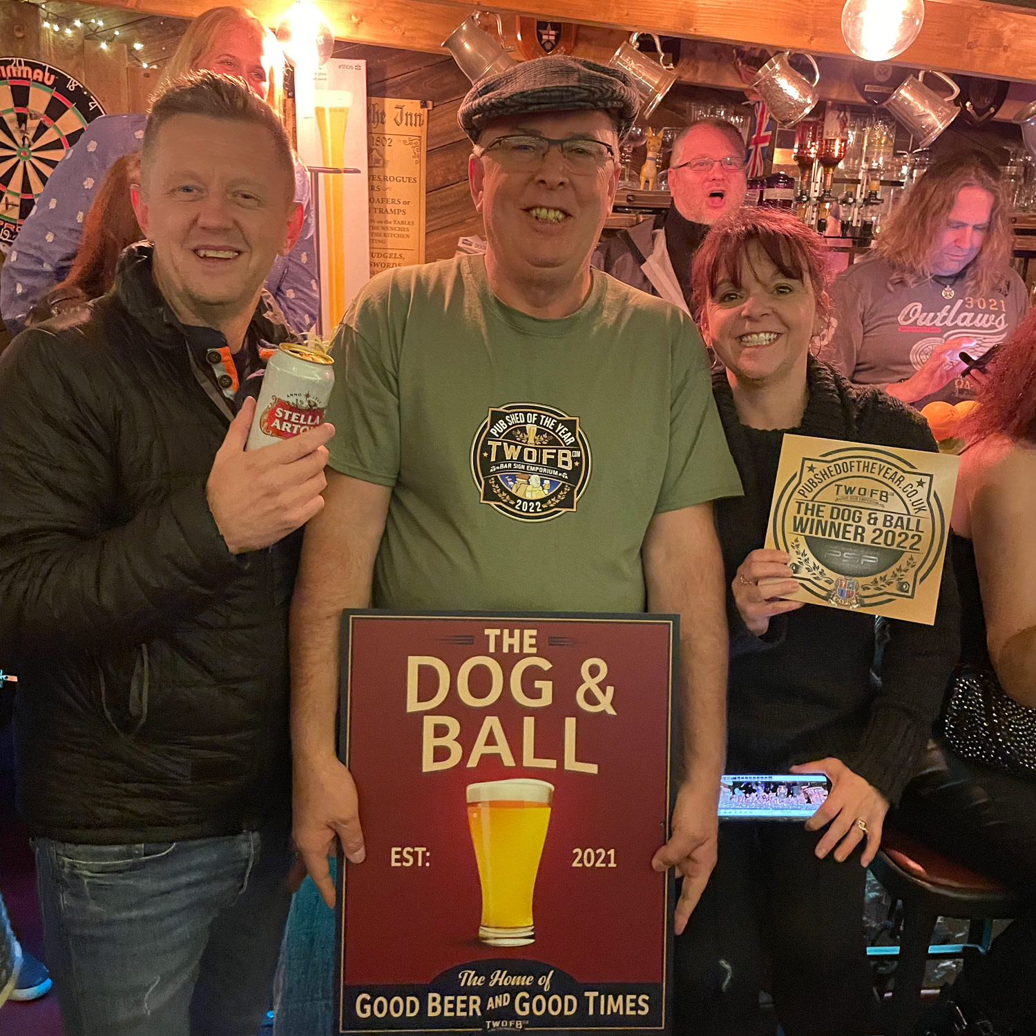 John poses with his wife and Ashley Turner from Two Fat Blokes CREDIT Ashley Turner Two Fat Blokes Bar Sign Emporium