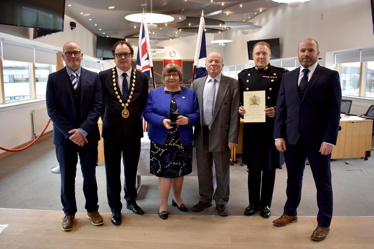 Kathleen Pollock receives the Elizabeth Cross 210219 CREDIT East Dunbartonshire Council .jpg	