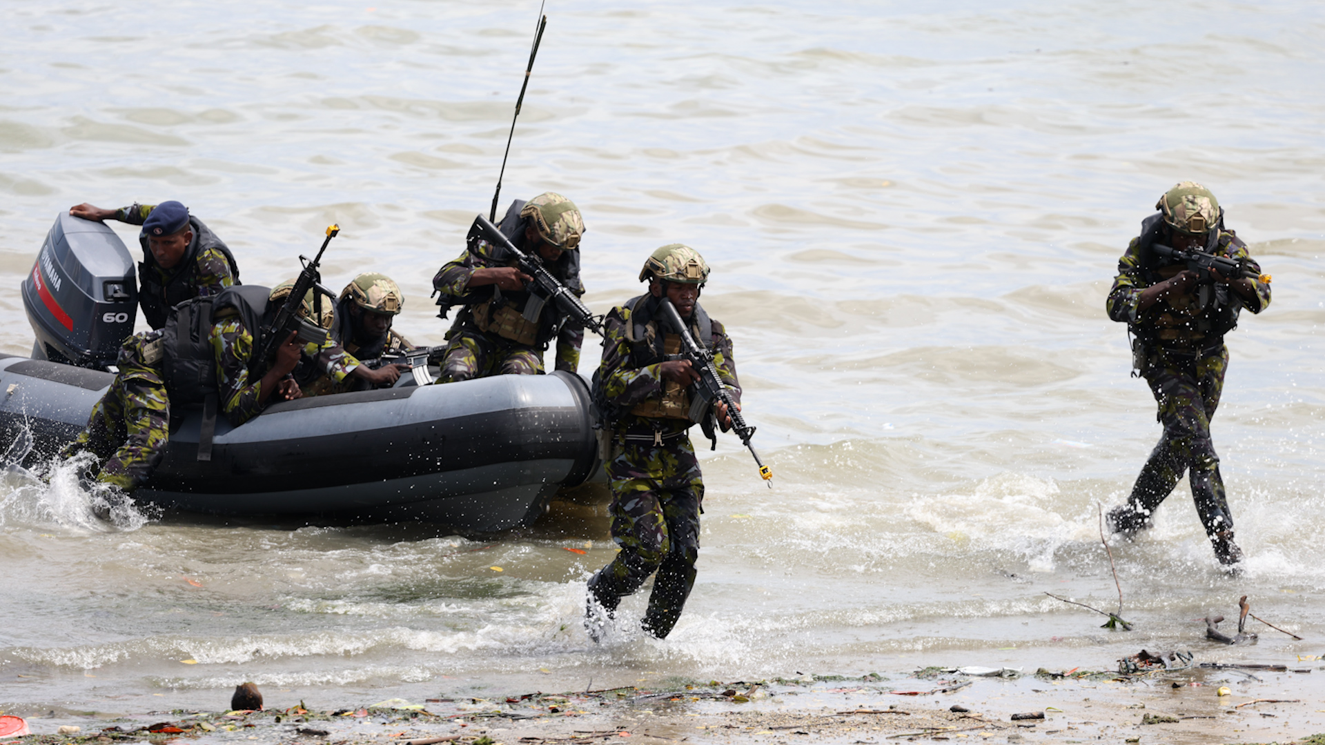 Kenya Marines, demonstrate a covert beach landing, showing defence collaboration in action 02112023 NO REUSE CREDIT PA WIRE, PA IMAGES