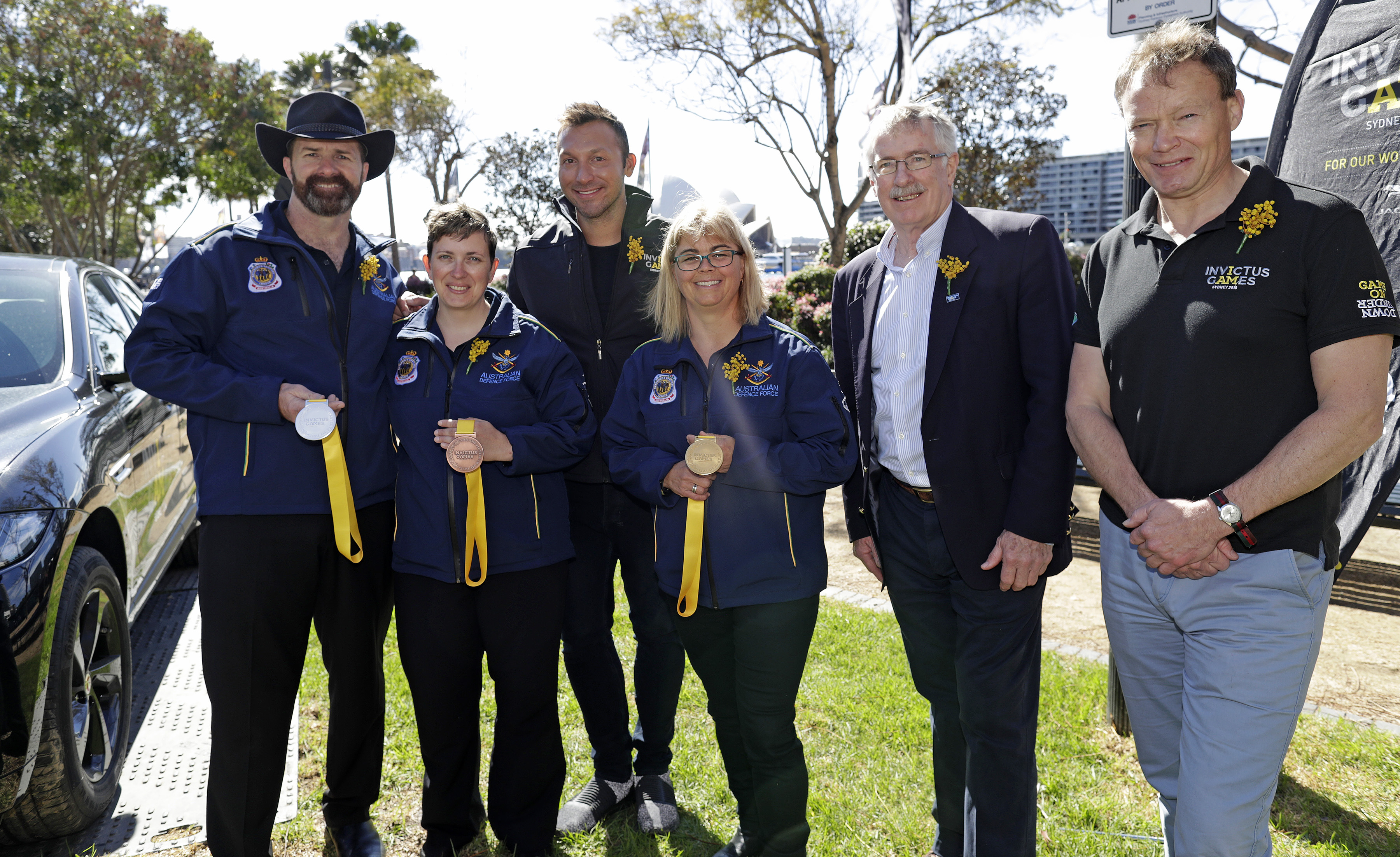 Kevin Jacoby, Carrie-Anne Bishop, Ian Thorpe OAM, Ross MacDiarmid and Patrick Kidd OBE pose with medals
