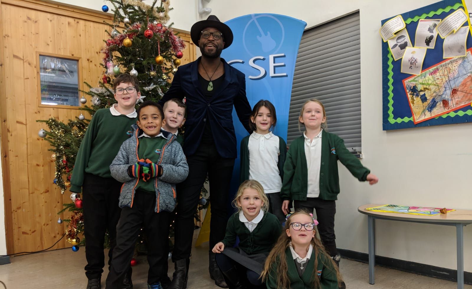 Kevin Davy White with children at Attenborough School, Germany