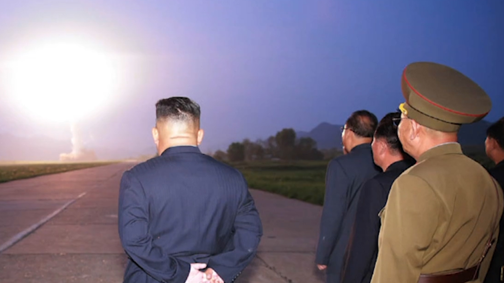 Kim Jong Un watches August 2019 missile launches 070819 credit KCNA.jpg