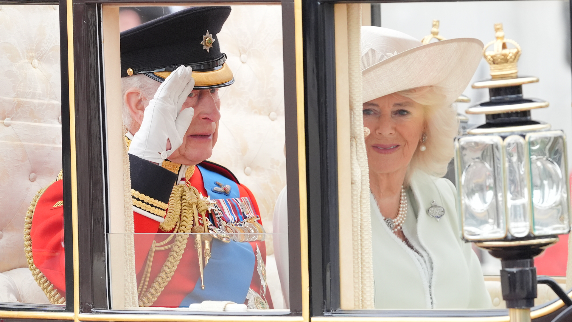 King Charles III and Queen Camilla travel along The Mall to the Trooping the Colour ceremony at Horse Guards Parade 150624 CREDIT PA