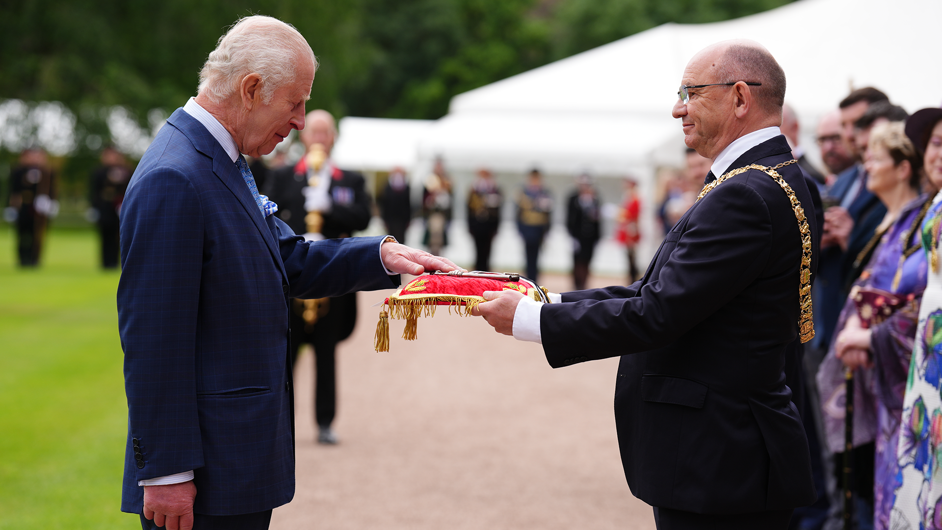 King Charles III receives the keys to the City of Edinburgh from Lord Provost Councillor Robert Aldridge as he takes part in the Ceremony of the Keys 020724 CREDIT PA
