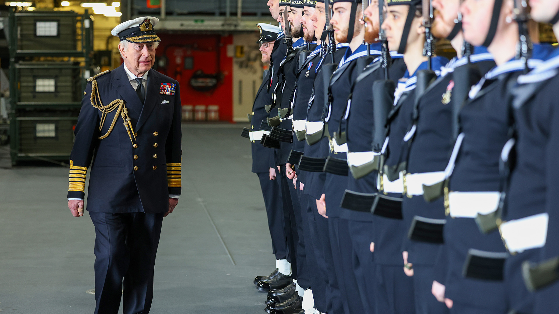 King Charles inspects sailors on board the HMS Prince of Wales