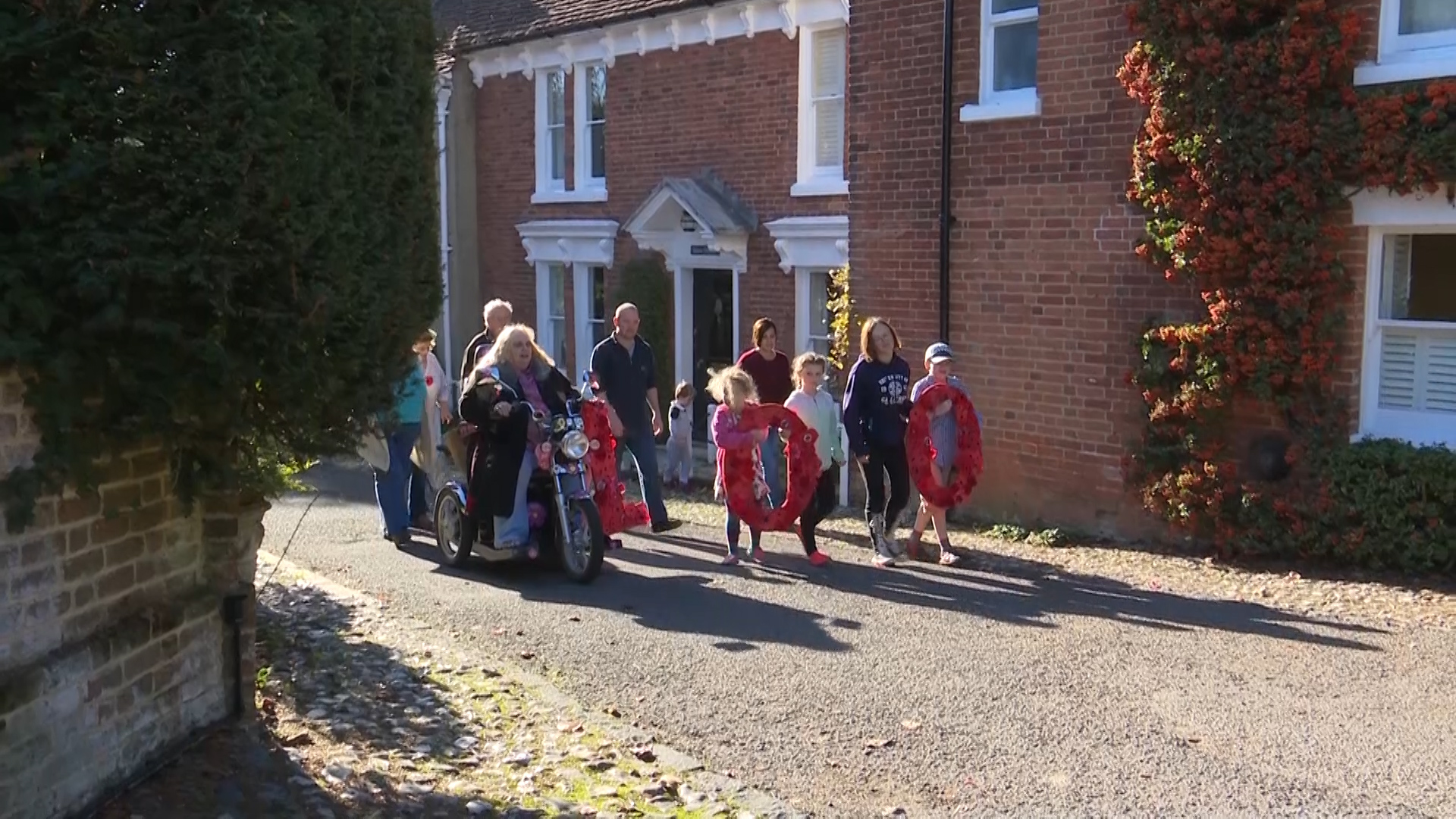 Knitted Poppies on their way to St Peter's 071118 CREDIT BFBS