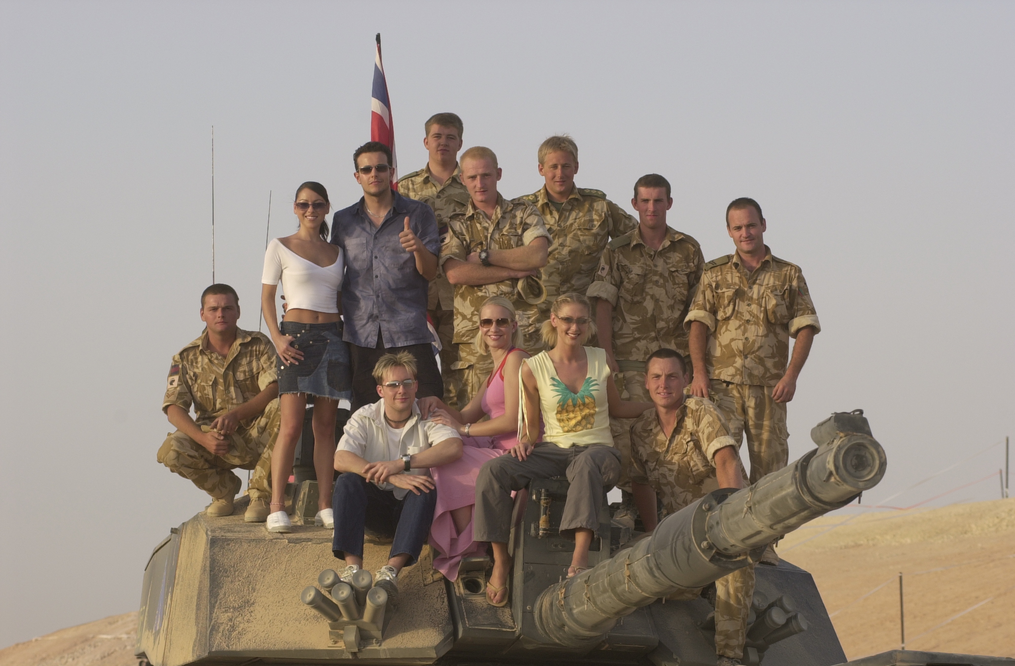Steps on a tank in Oman ahead of CSE show in 2001