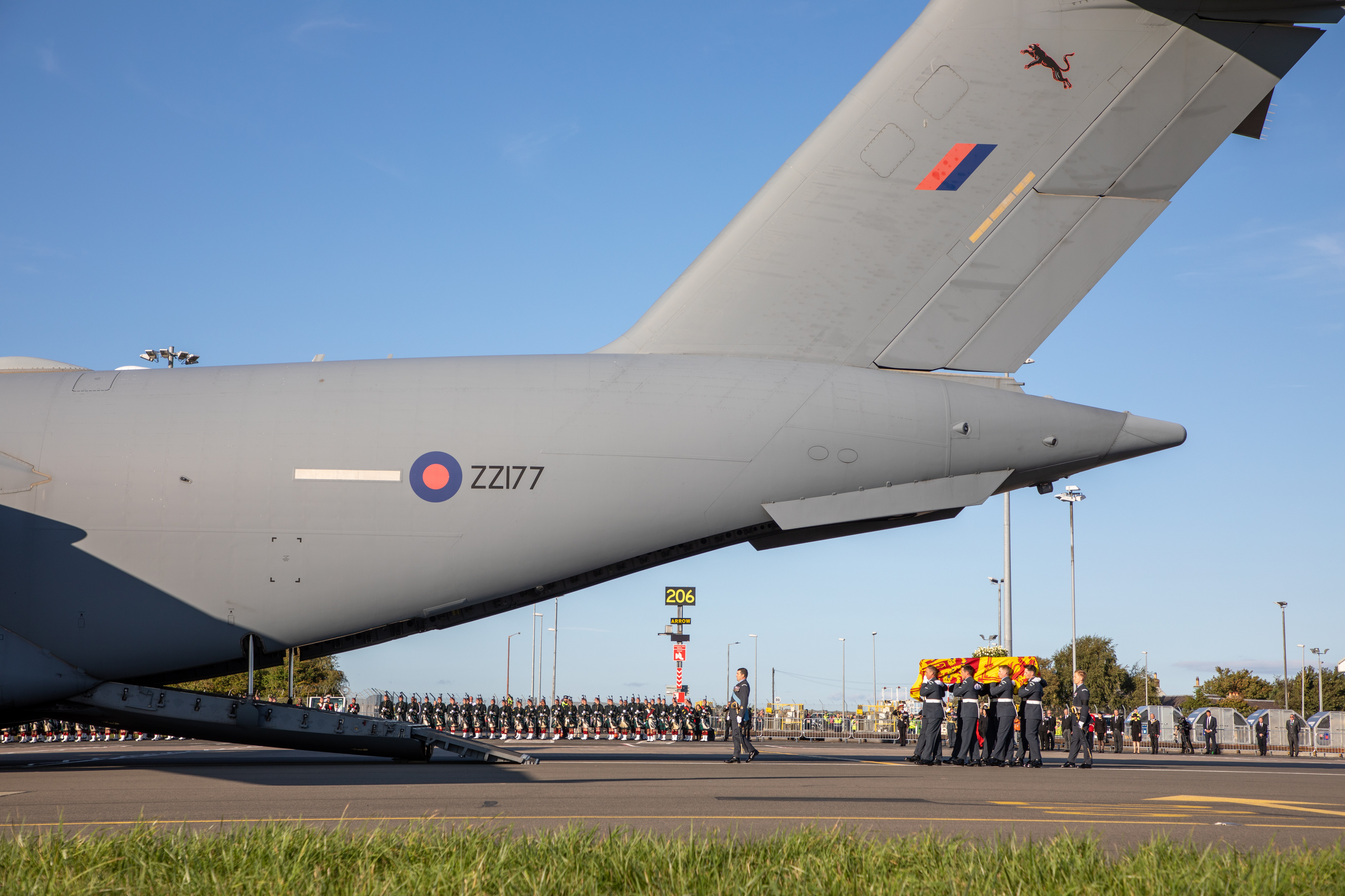 Pallbearers from the Royal Air Force Regiment carry the coffin of Her Majesty Queen Elizabeth II into an awaiting C17 aircraft before the flight to RAF Northolt (Picture A/CPL Ciaran McFalls RAF / UK MOD Crown Copyright).