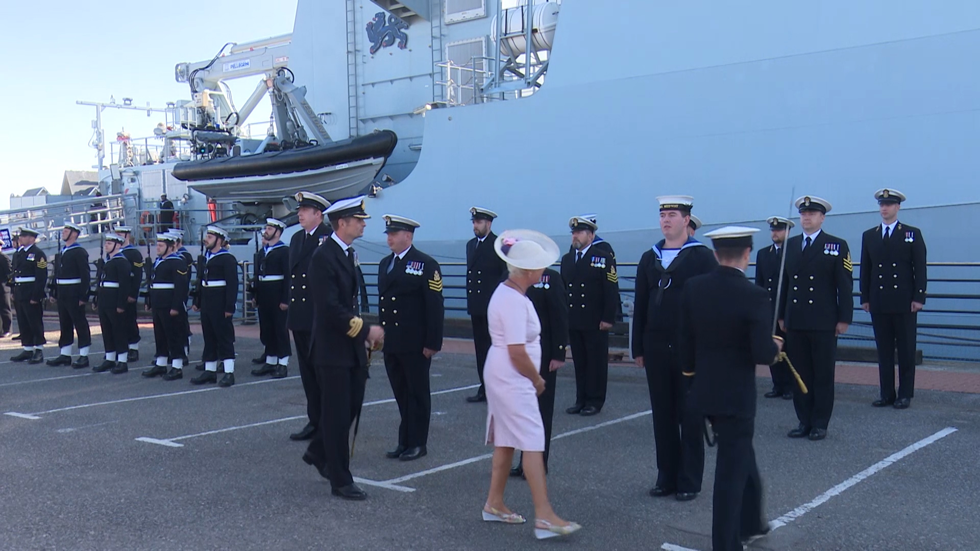 Lady Fallon inspects HMS Medway's company.
