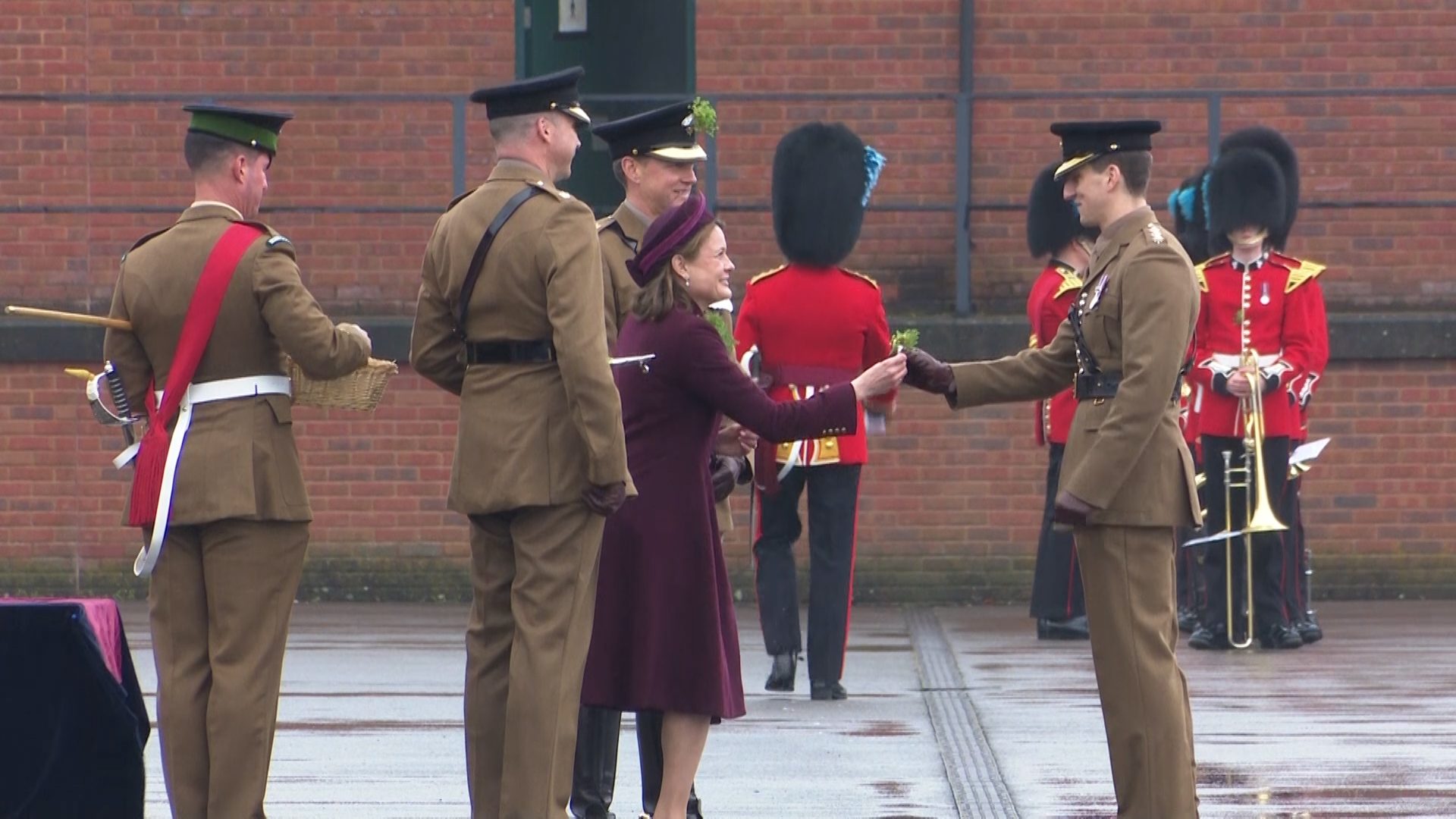 Lady Ghika, wife of the Regimental Lieutenant Colonel, Major General Sir Christopher Ghika, presented a shamrock to Officers and Warrant Officers 170324 CREDIT BFBS