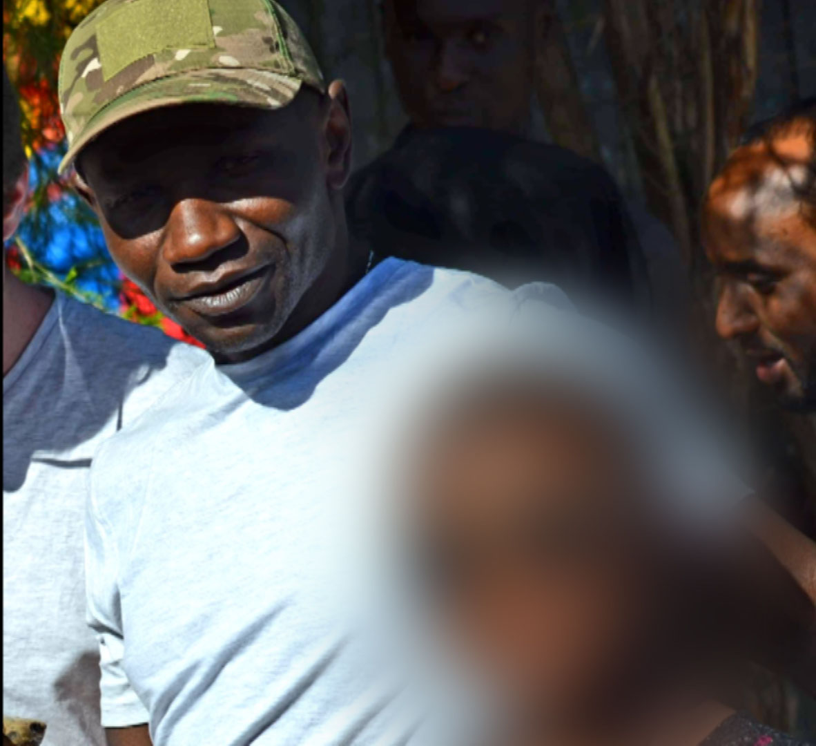 Lance Corporal Denis Omondi with his daughter