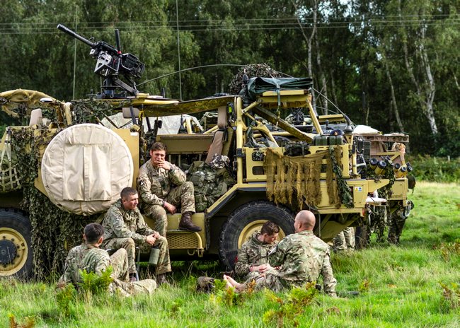 Light Dragoons rest next to Jackal Armoured Vehicle Thetford and Salisbury Plain Training Areas ahead of Mali Deployment 09102020 CREDIT MOD