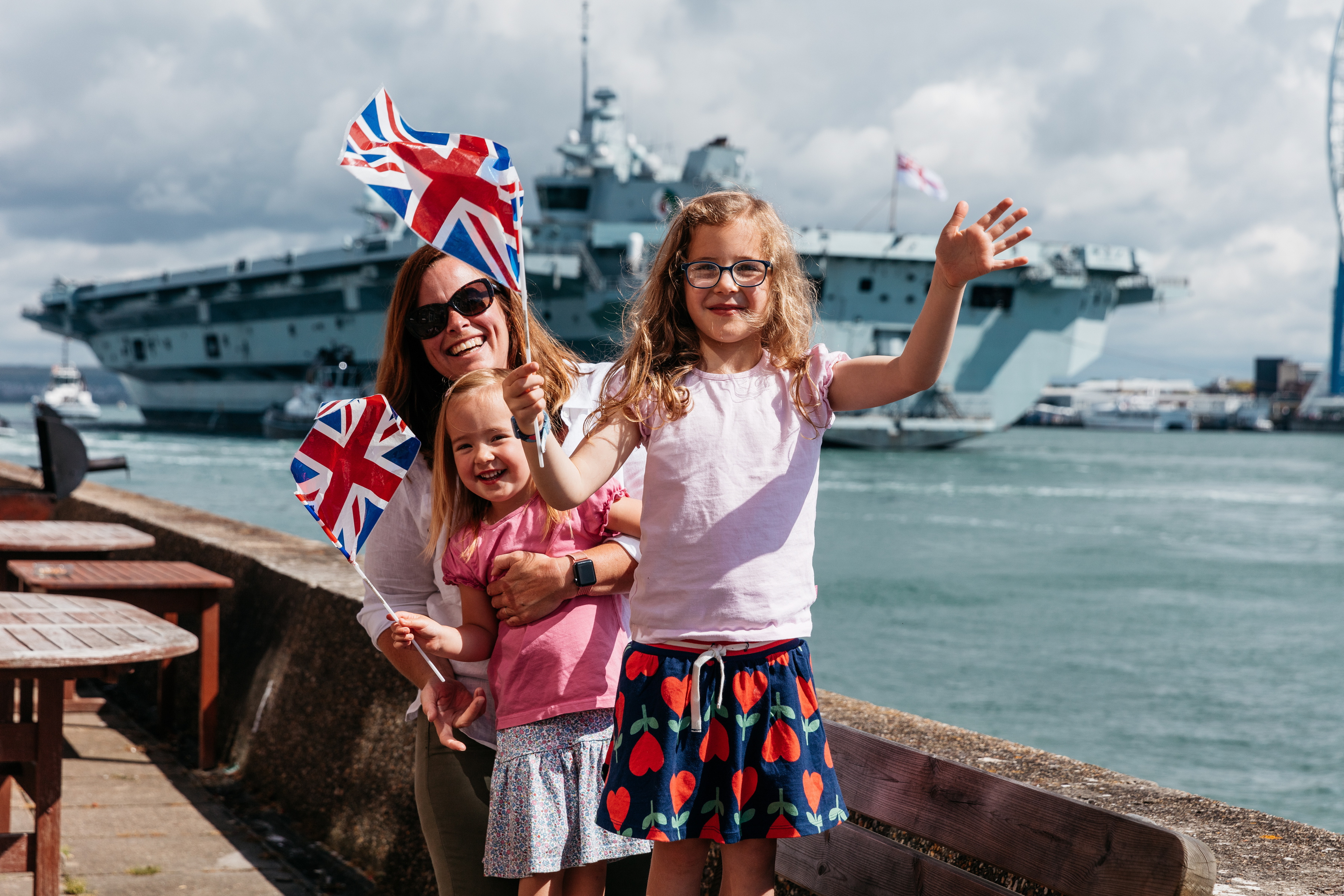 Families watched the ship's arrival as they eagerly awaited to be reunited with loved ones (Picture: MOD).
