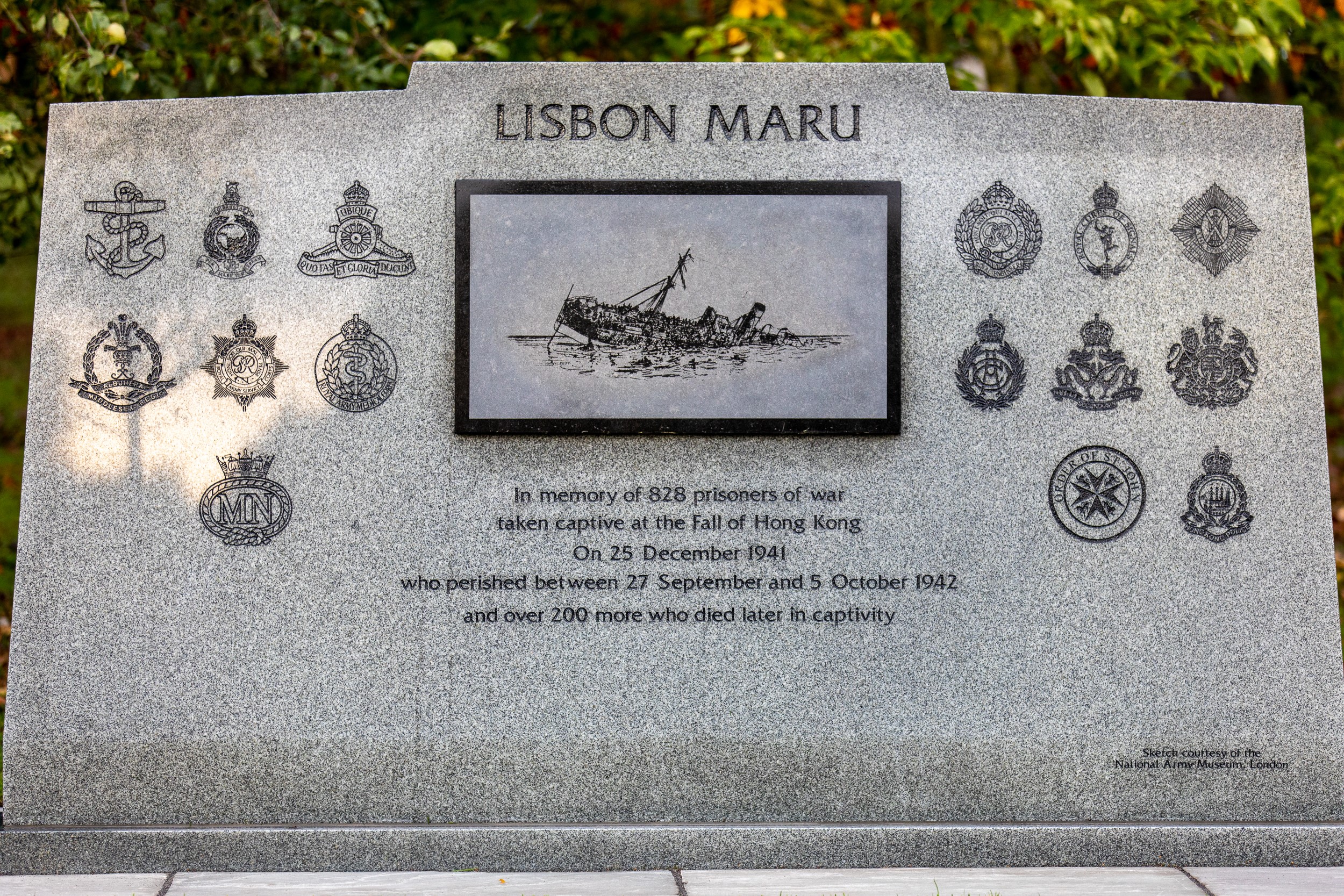 Families laying wreaths at Lisbon Maru memorial. Picture: Paul Armstrong.