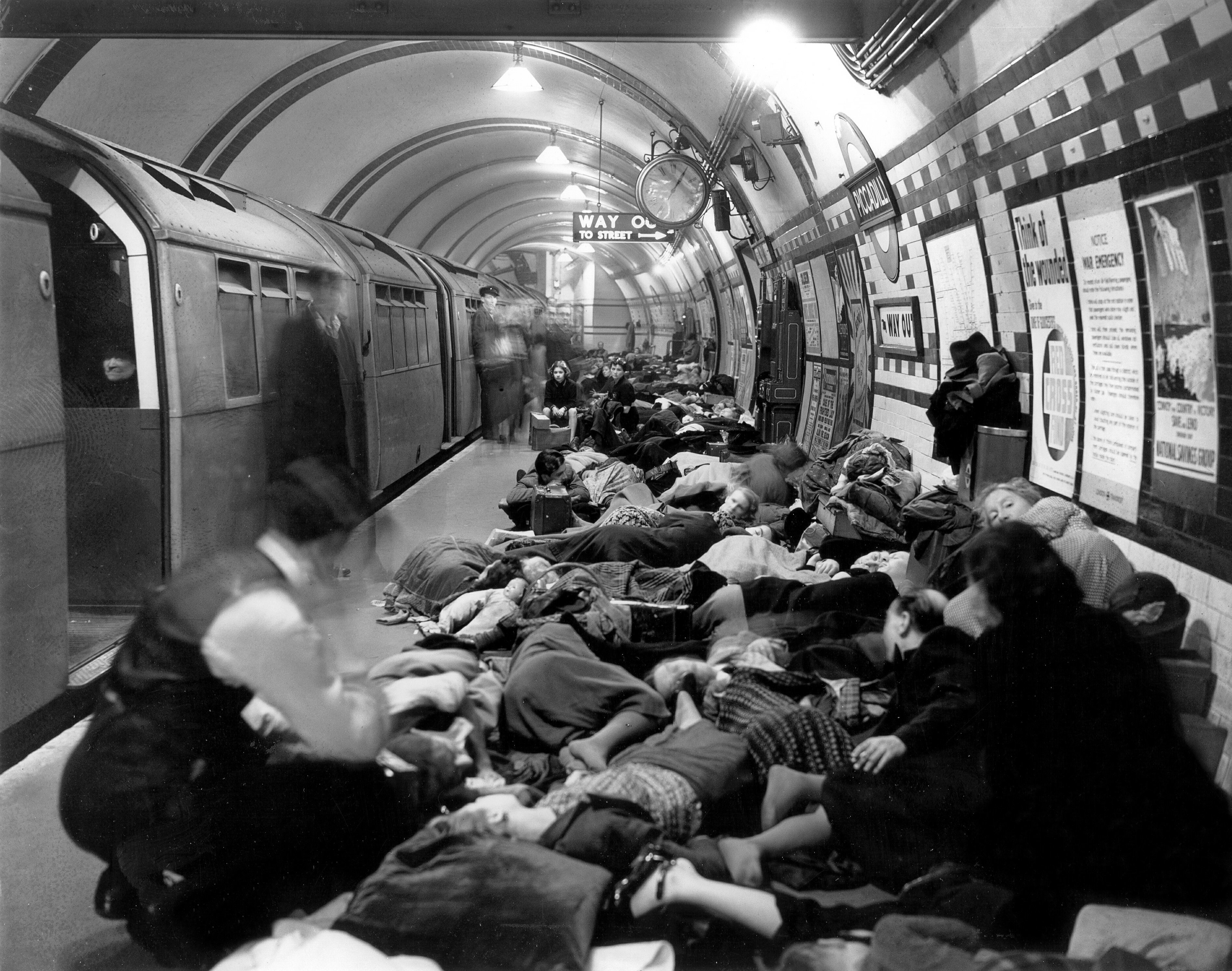 Londoners sleep in a West End underground station during Germany's bombing campaign, The Blitz, in September 1940 (Picture: PA).