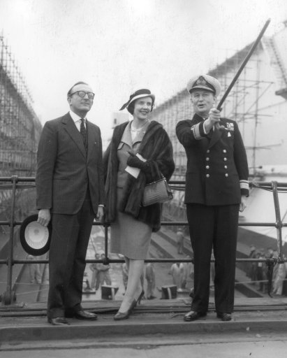 Lord Carrington, First Lord of the Admiralty, and Lady Carrington with Rear-Admiral JH Unwin at Portsmouth Dockyard (Picture: PA).