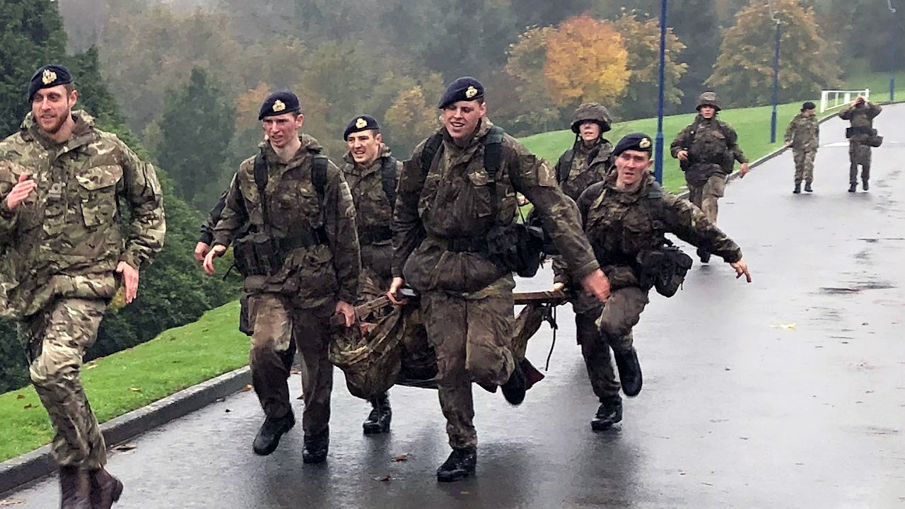 Lt Read accompanies cadets during a leadership challenge at Dartmouth