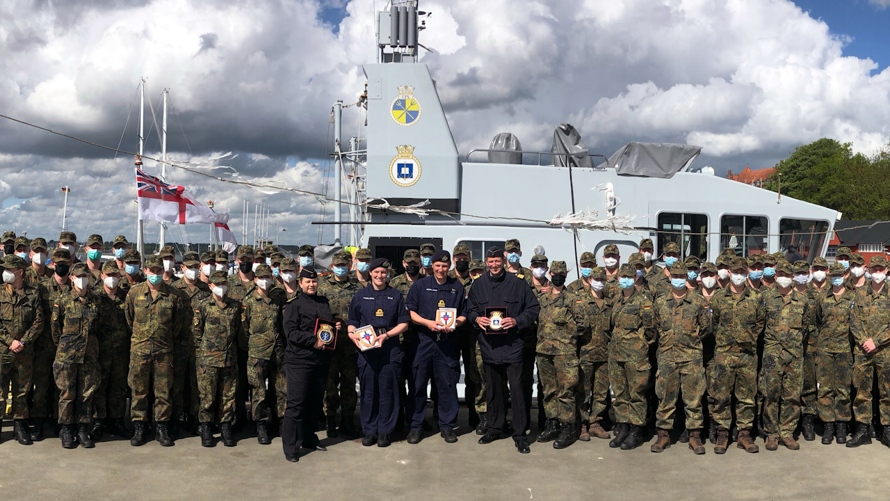 Lieutenant Read pictured with German cadets with HMS Exploit (Picture: Royal Navy).