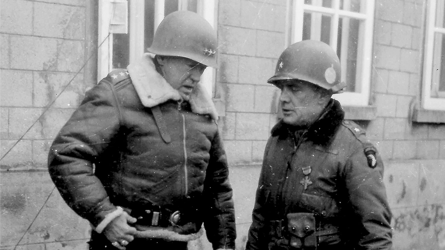 Lt Gen George S Patton speaks to Brig Gen Anthony McAuliffe in January 1945 CREDIT US Army