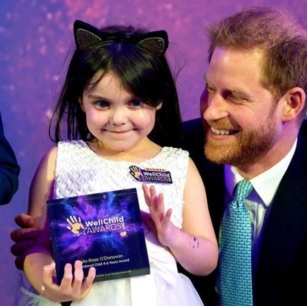 Lyla O'Donovan with Prince Harry (Picture: Brain Tumour Research) 