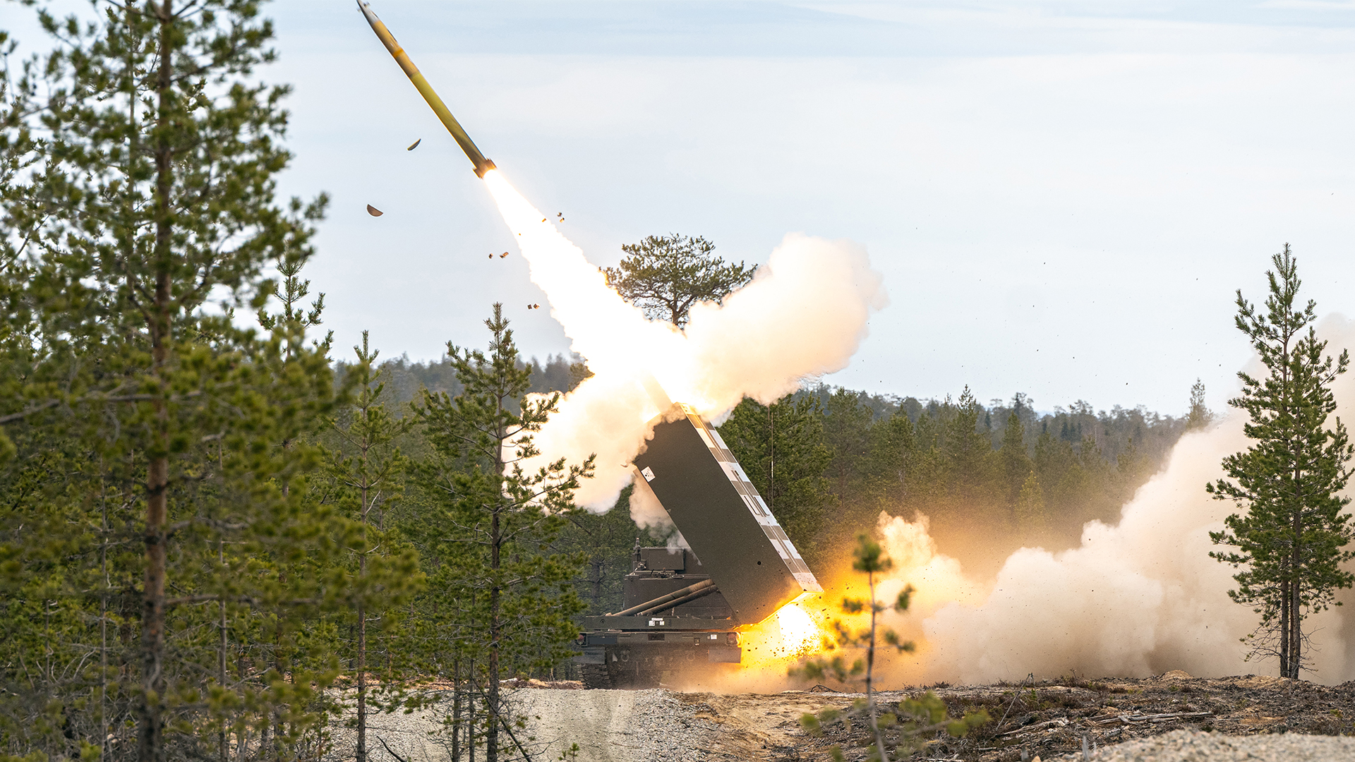 The M270B1 Multiple Launch Rocket System, firing the M31 Guided Multiple Launch Rocket System munition, is the mainstay of the British Army's deep fires capability