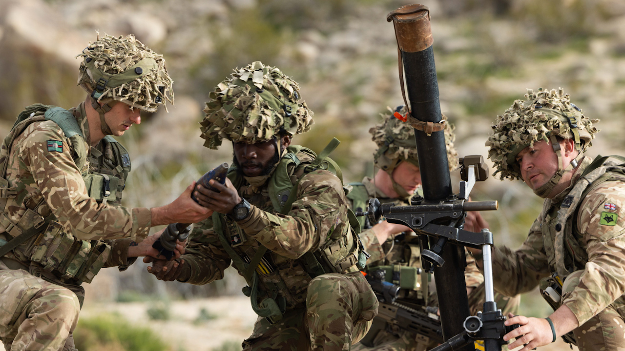 Soldiers from the 2 Yorks mortar platoon test the new MWAD device fitted to the tube, which provides a more accurate delivery of fire (Picture: British Army)