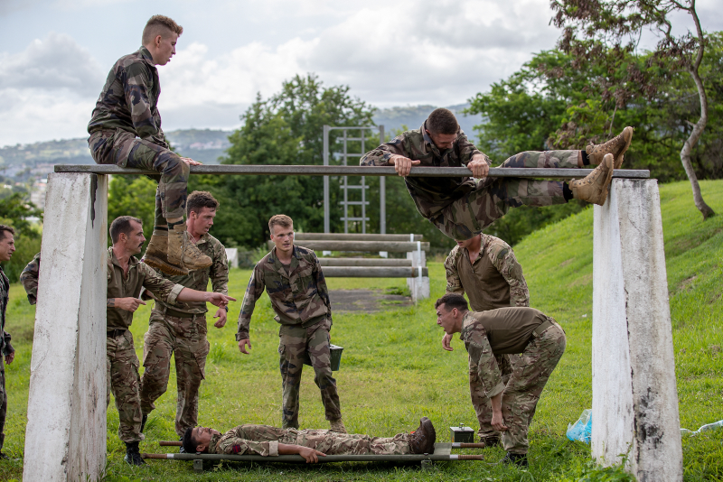 Members of the Royal Navy HADR Troop and the French troops taking part in the stretcher assault course at at Fort Saint Louis, Fort De France, Martinique.