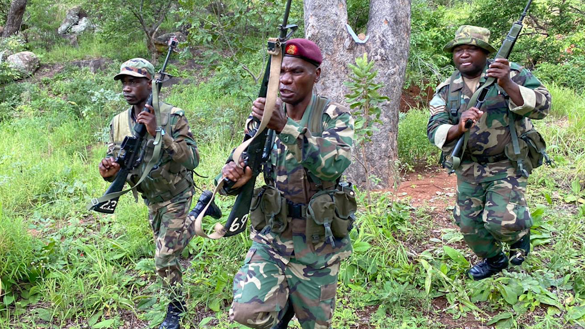Malawi Defence Force troops learn tactical skills from British personnel.