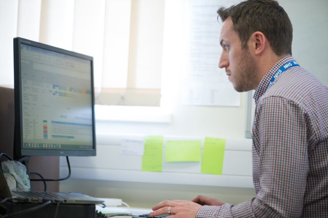 NHS Employee on PC
