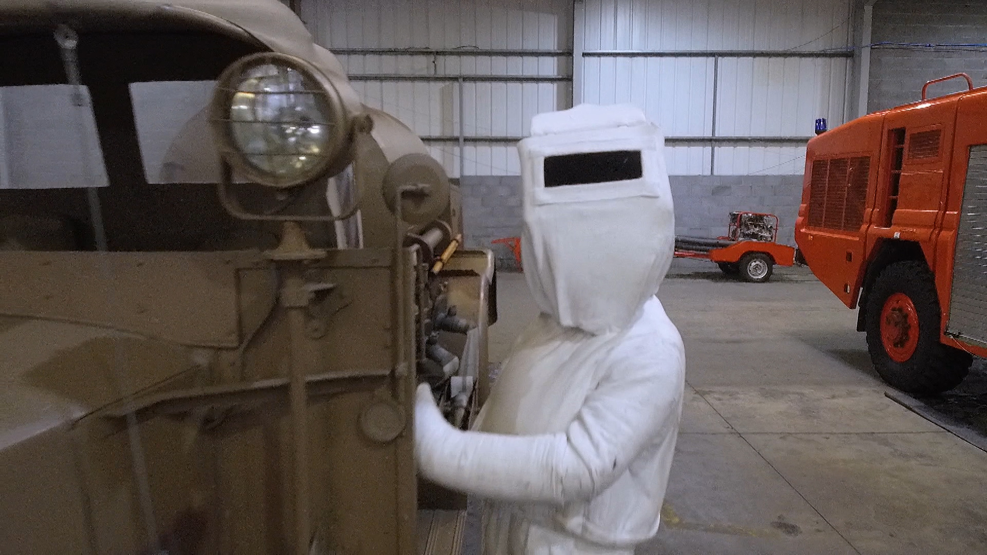 Mannequin with white asbestos suit 151019 CREDIT BFBS.jpg