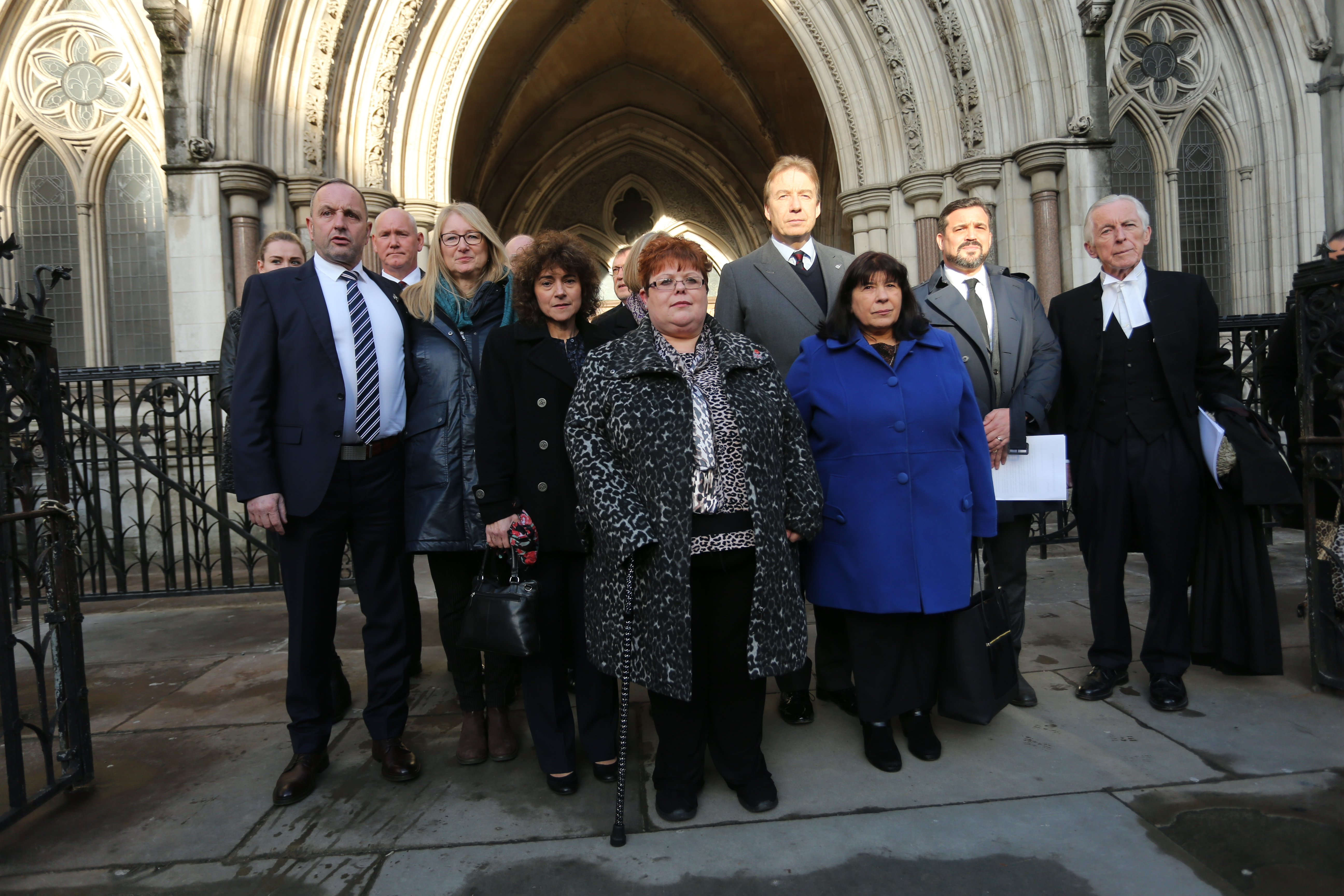 Mark Tipper, Sarah-Jane Young and other family members of Hyde Park bombing victims outside High Court