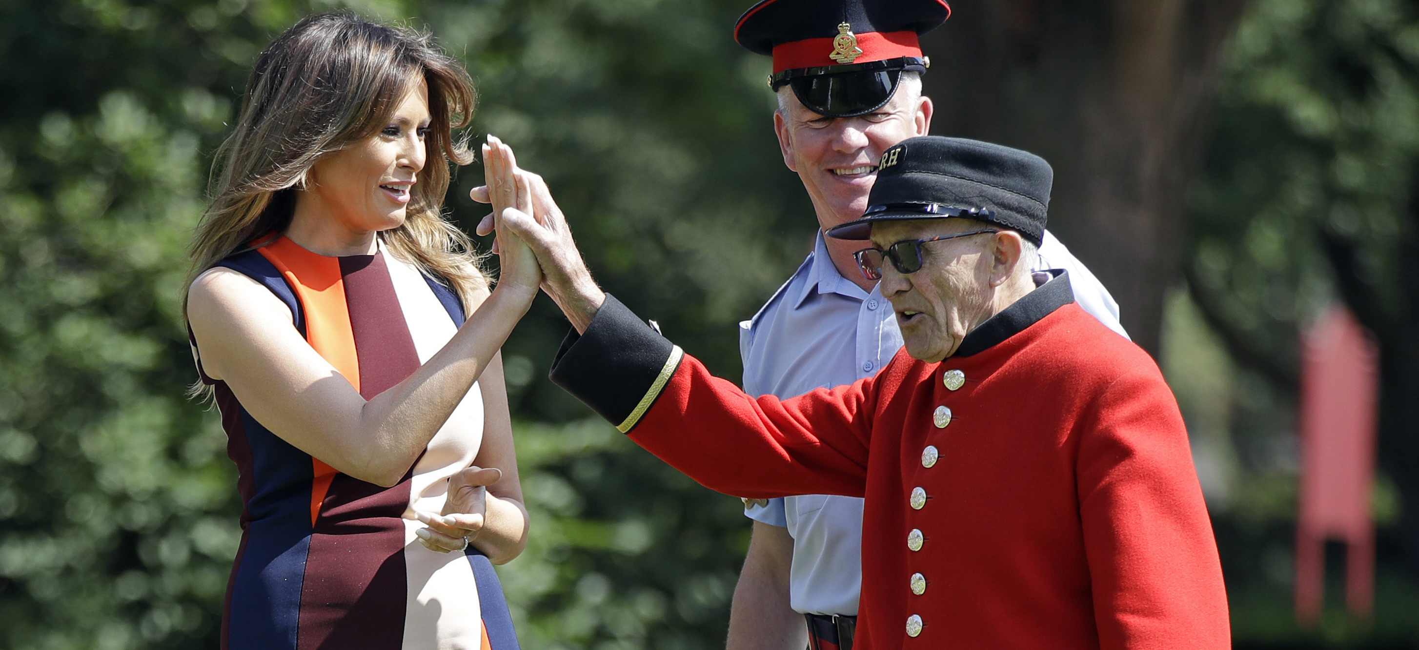 Melania Chelsea pensioner high five CREDIT PA