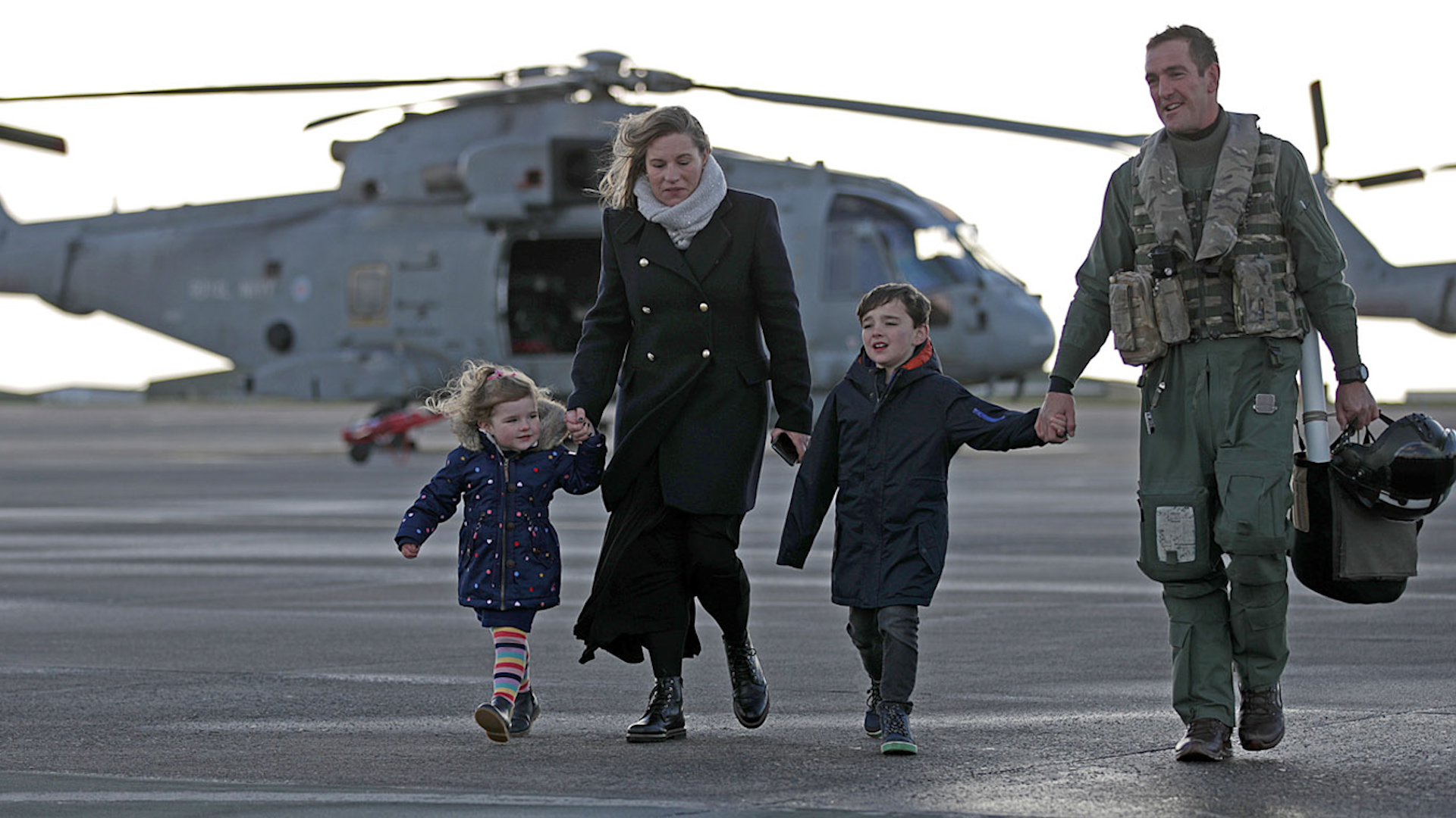 Member of 820 Naval Air Squadron returning to RNAS Culdrose after returning from the Carrier Strike Group 21 (CSG21) deployment